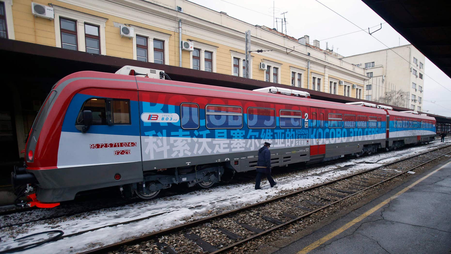 Jan. 14, 2017: A railroad worker walks by the first train decorated with letters that read "Kosovo is Serbian" written in twenty languages departing from the Belgrade to Mitrovica, Kosovo at Belgrade's railway station, Serbia.