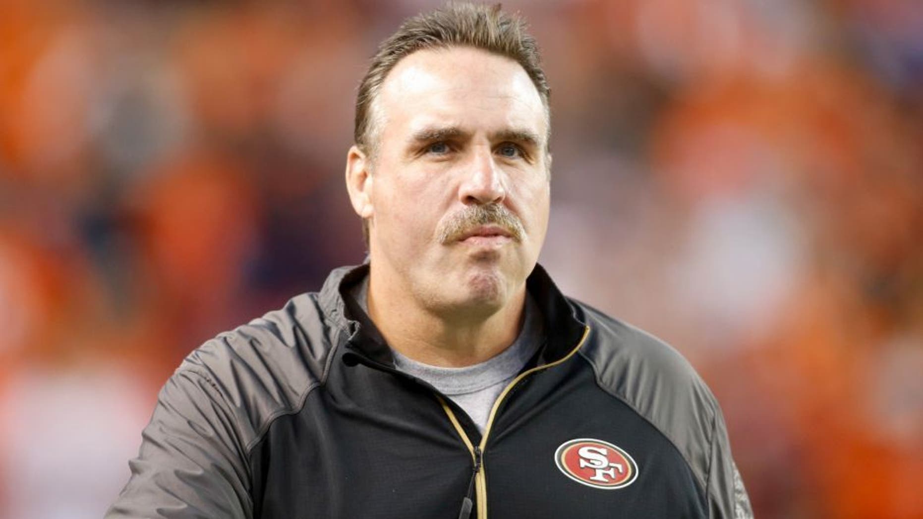 Oct 19, 2014; Denver, CO, USA; San Francisco 49ers defensive line coach Jim Tomsula before the game against the Denver Broncos at Sports Authority Field at Mile High. Mandatory Credit: Chris Humphreys-USA TODAY Sports