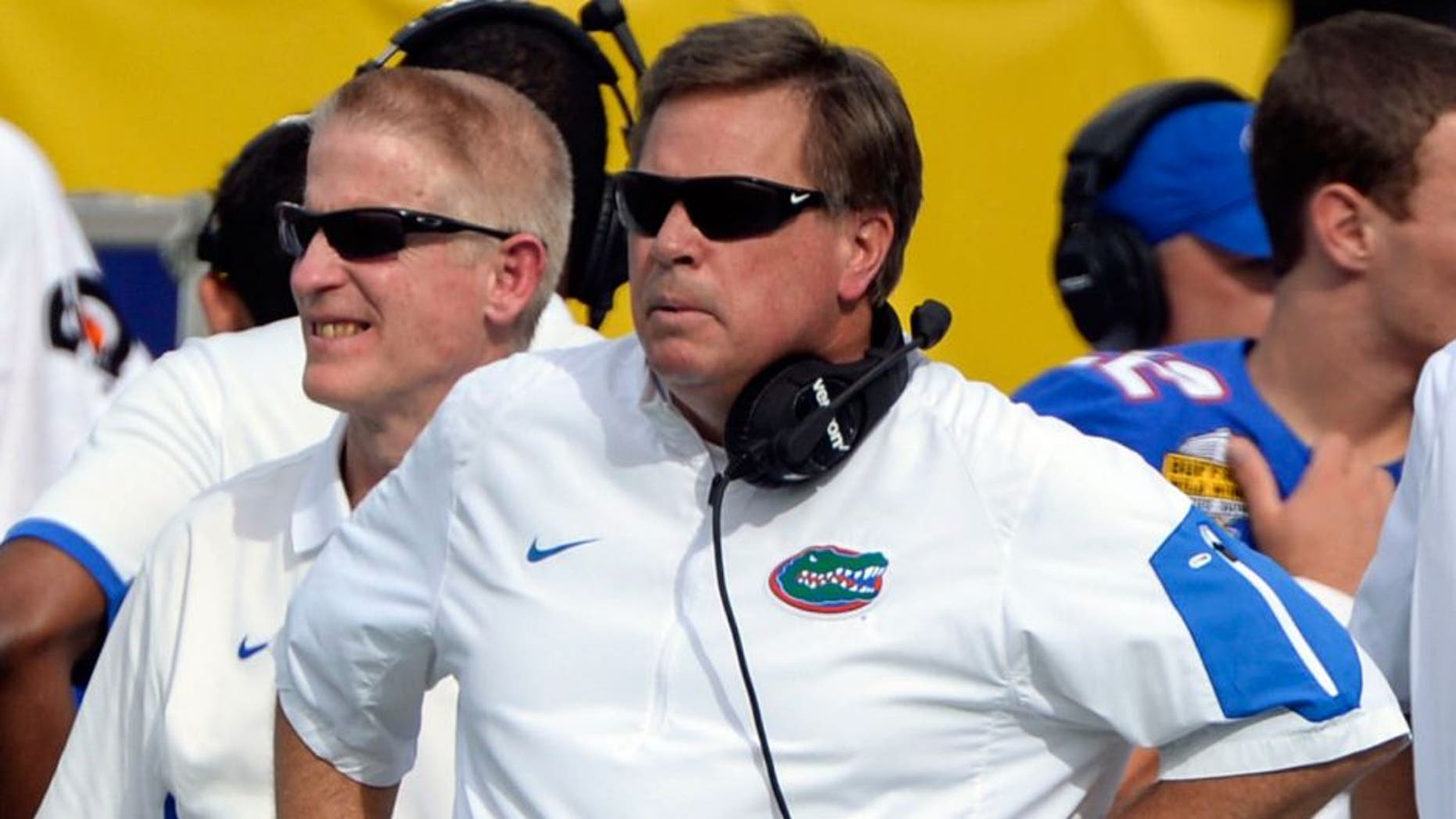 Jan 1, 2016; Orlando, FL, USA; Florida Gators head coach Jim McElwain looks onto the field during the second quarter against the Michigan Wolverines in the 2016 Citrus Bowl at Orlando Citrus Bowl Stadium. Mandatory Credit: Tommy Gilligan-USA TODAY Sports