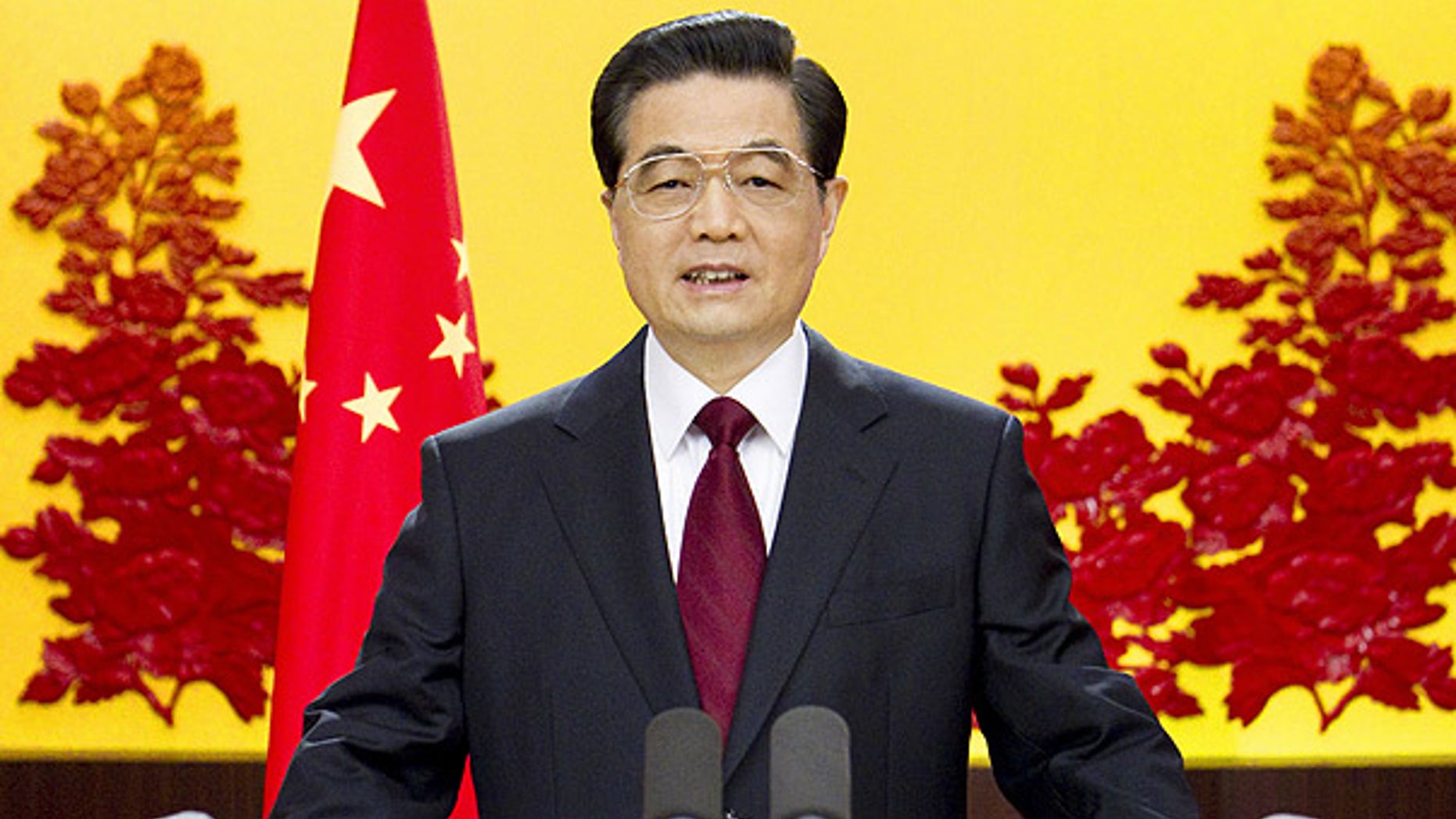 Dec. 31, 2010: Chinese President Hu Jintao delivers a New Year's address in Beijing.