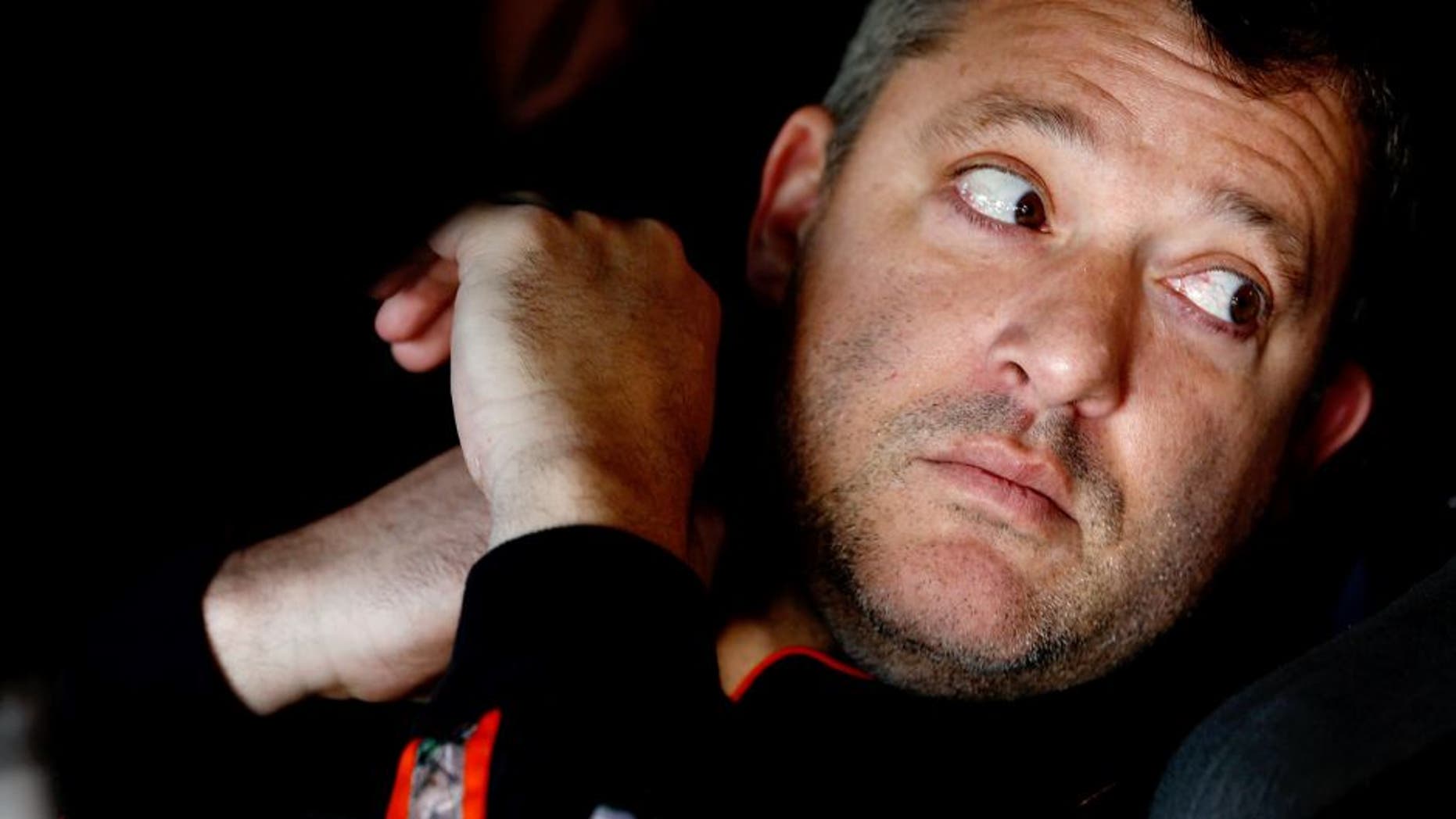 MARTINSVILLE, VA - OCTOBER 30: Tony Stewart, driver of the #14 Bass Pro Shops/Mobil 1 Chevrolet, sits in his car in the garage area during practice for the NASCAR Sprint Cup Series Goody's Headache Relief Shot 500 at Martinsville Speedway on October 30, 2015 in Martinsville, Virginia. (Photo by Jeff Zelevansky/Getty Images)