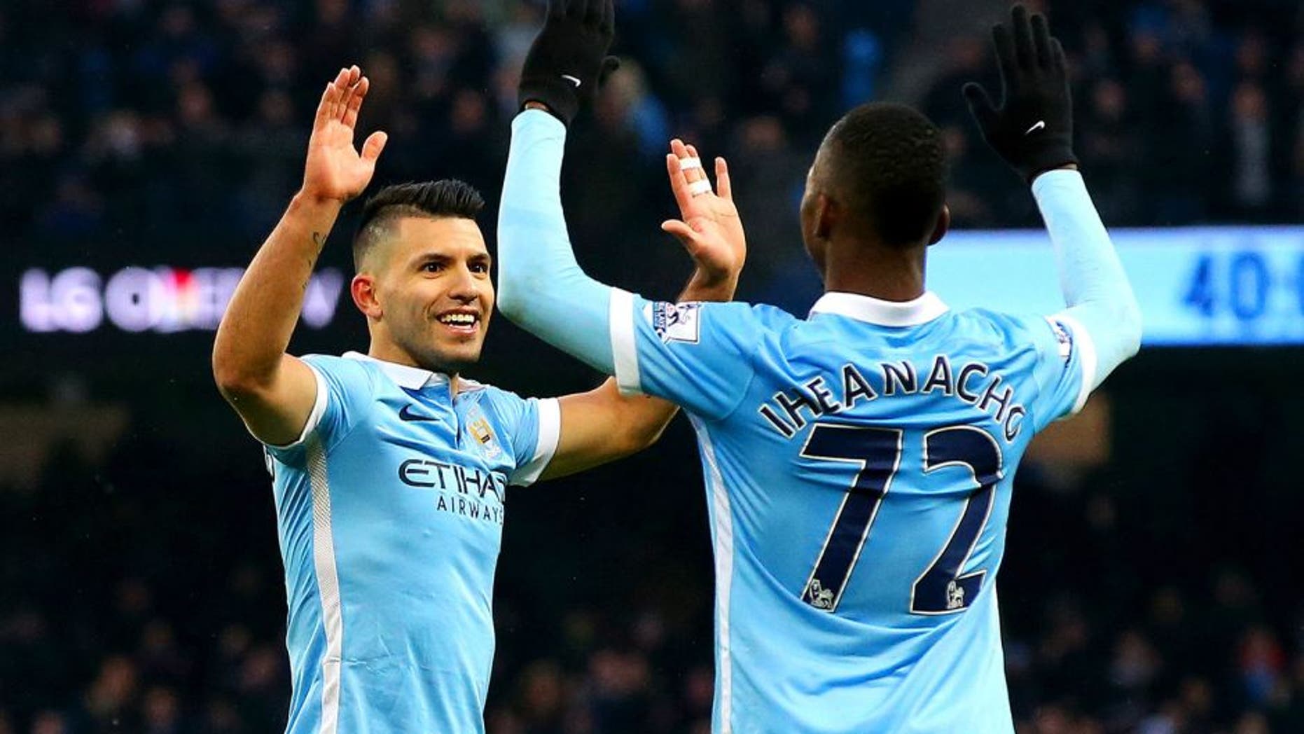 MANCHESTER, ENGLAND - JANUARY 16: Sergio Aguero of Manchester City celebrates with team-mate Kelechi Iheanacho after scoring his team's second goal during the Barclays Premier League match between Manchester City and Crystal Palace at Etihad Stadium on January 16, 2016 in Manchester, England. (Photo by Alex Livesey/Getty Images)