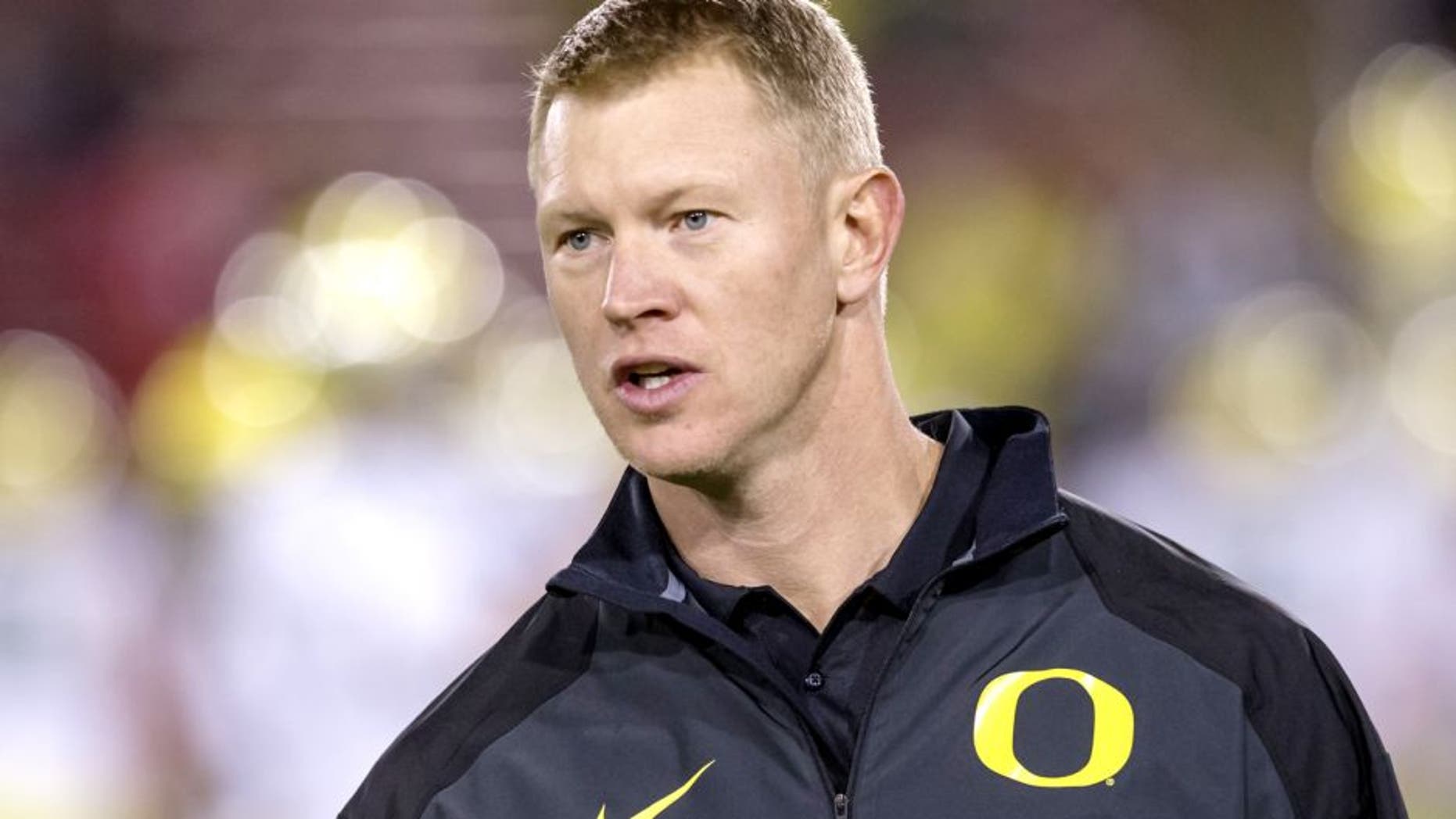 PALO ALTO, CA - NOVEMBER 7: Scott Frost, University of Oregon Offensive Coordinator, works with the Oregon Ducks team prior to a PAC-12 NCAA football game against the Stanford Cardinal played on November 7, 2013 at Stanford Stadium in Palo Alto, California. Frost played for Stanford during a portion of his own collegiate career. (Photo by David Madison/Getty Images)