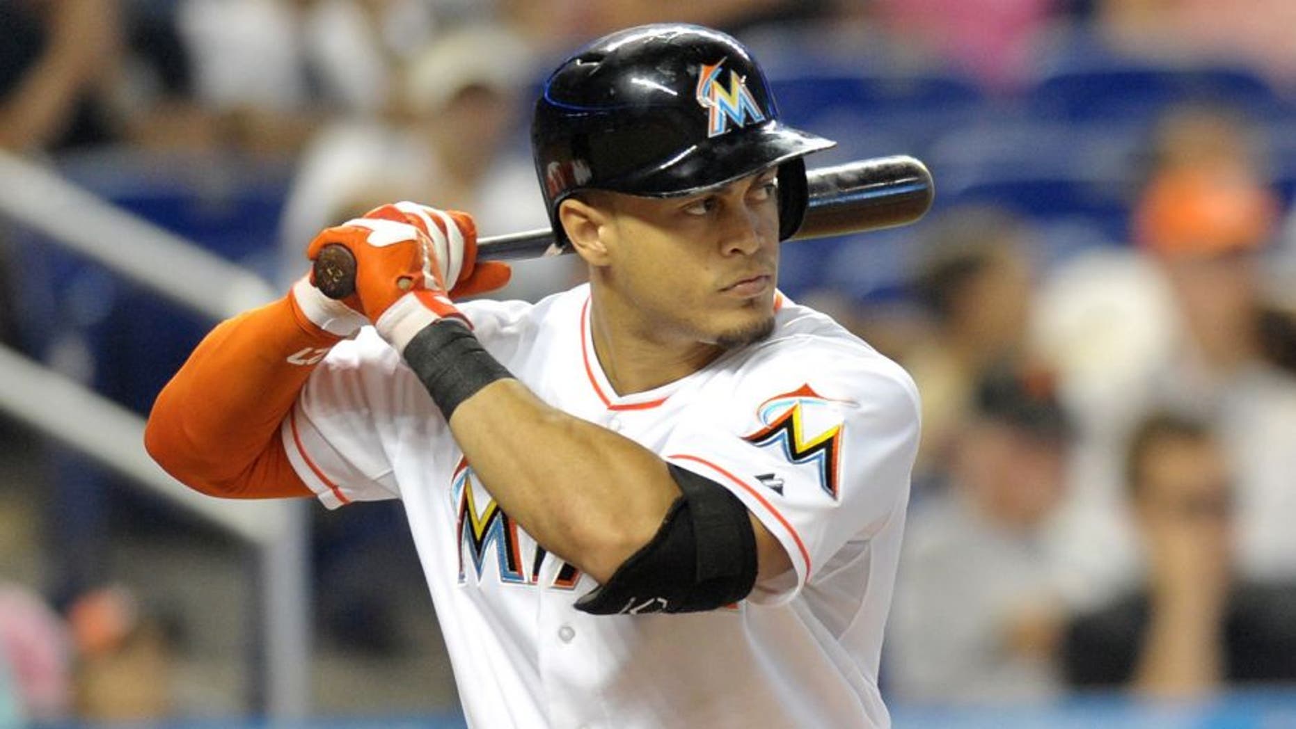 Aug 1, 2013; Miami, FL, USA; Miami Marlins right fielder Giancarlo Stanton (27) at bat against the New York Mets at Marlins Park. Mandatory Credit: Steve Mitchell-USA TODAY Sports