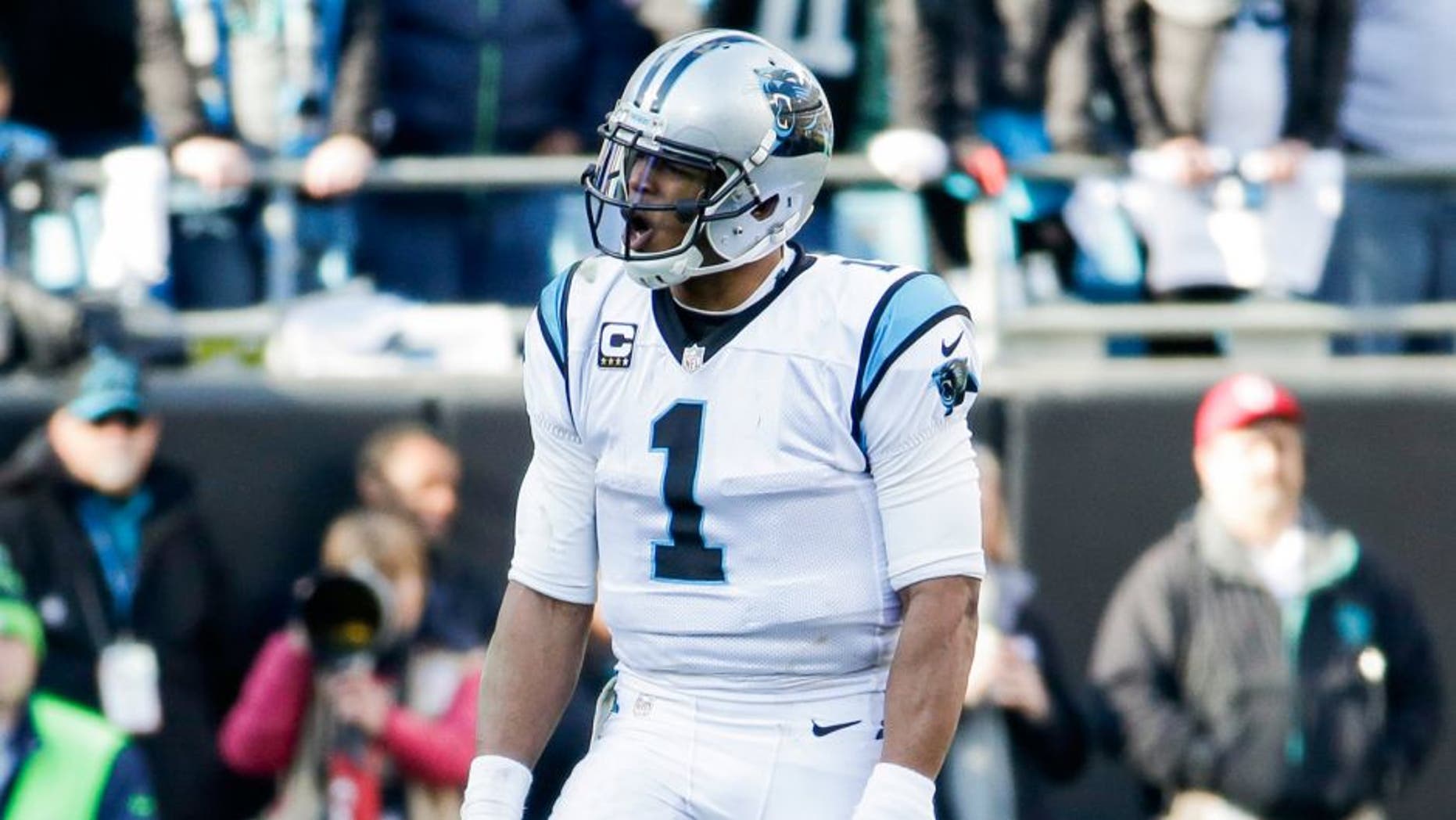 Jan 17, 2016; Charlotte, NC, USA; Carolina Panthers quarterback Cam Newton (1) reacts during the fourth quarter against the Seattle Seahawks in a NFC Divisional round playoff game at Bank of America Stadium. Mandatory Credit: Jeremy Brevard-USA TODAY Sports