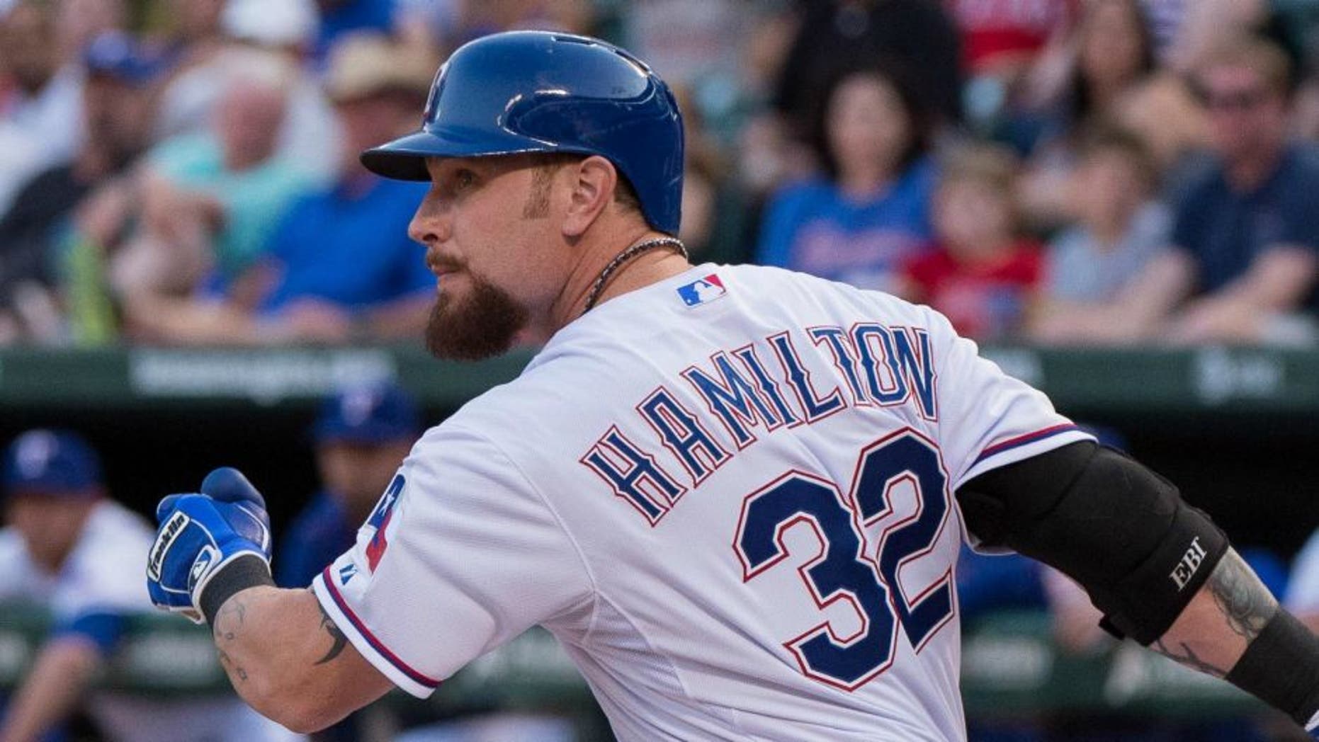 Aug 15, 2015; Arlington, TX, USA; Texas Rangers left fielder Josh Hamilton (32) bats against the Tampa Bay Rays during the game at Globe Life Park in Arlington. The Rangers defeated the Rays 12-4. Mandatory Credit: Jerome Miron-USA TODAY Sports