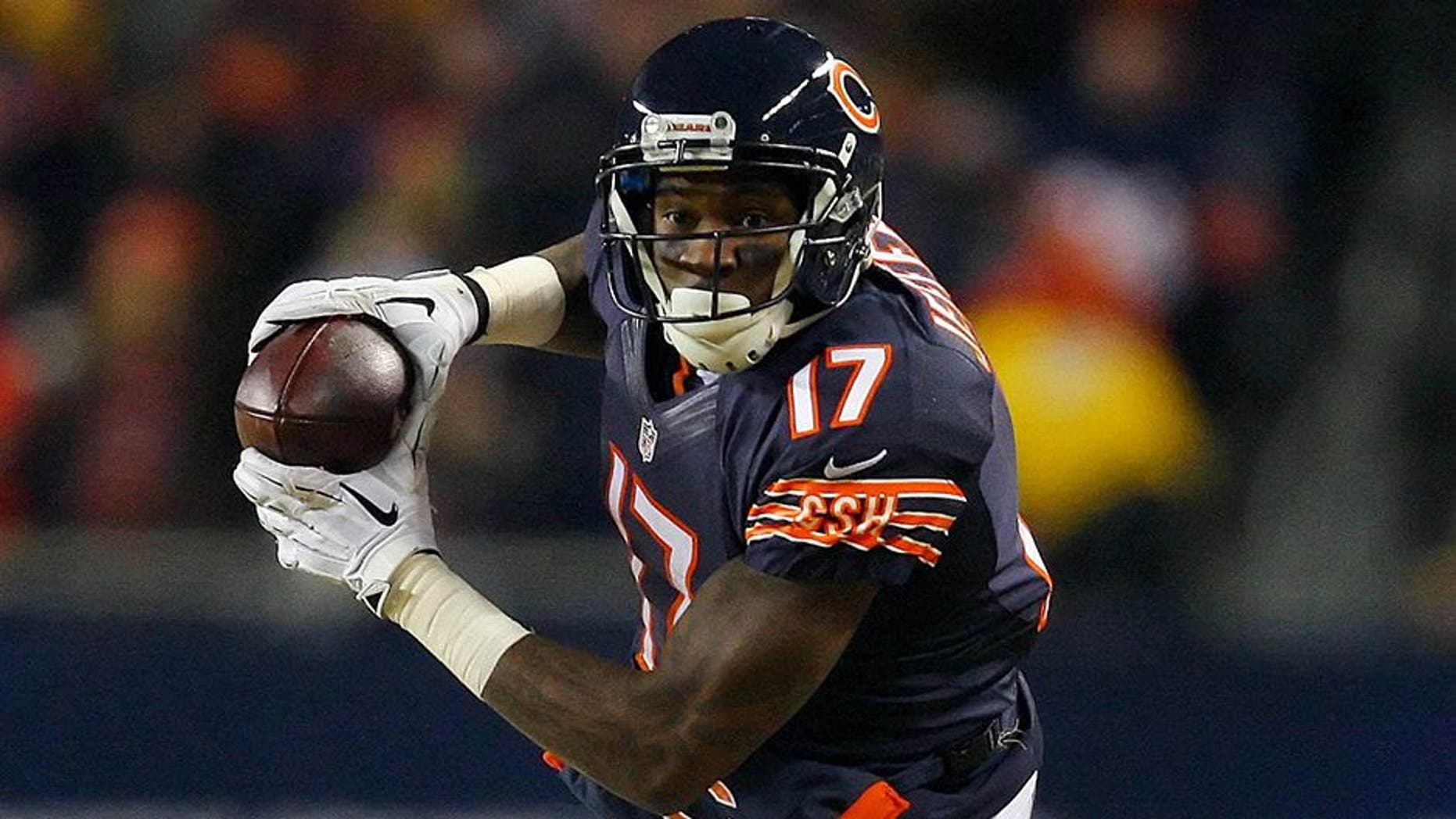 Dec 29, 2013; Chicago, IL, USA; Chicago Bears wide receiver Alshon Jeffery (17) makes a 67 yard pass reception with Green Bay Packers cornerback Sam Shields (37) defending during the second half at Soldier Field. Green Bay won 33-28. Mandatory Credit: Dennis Wierzbicki-USA TODAY Sports