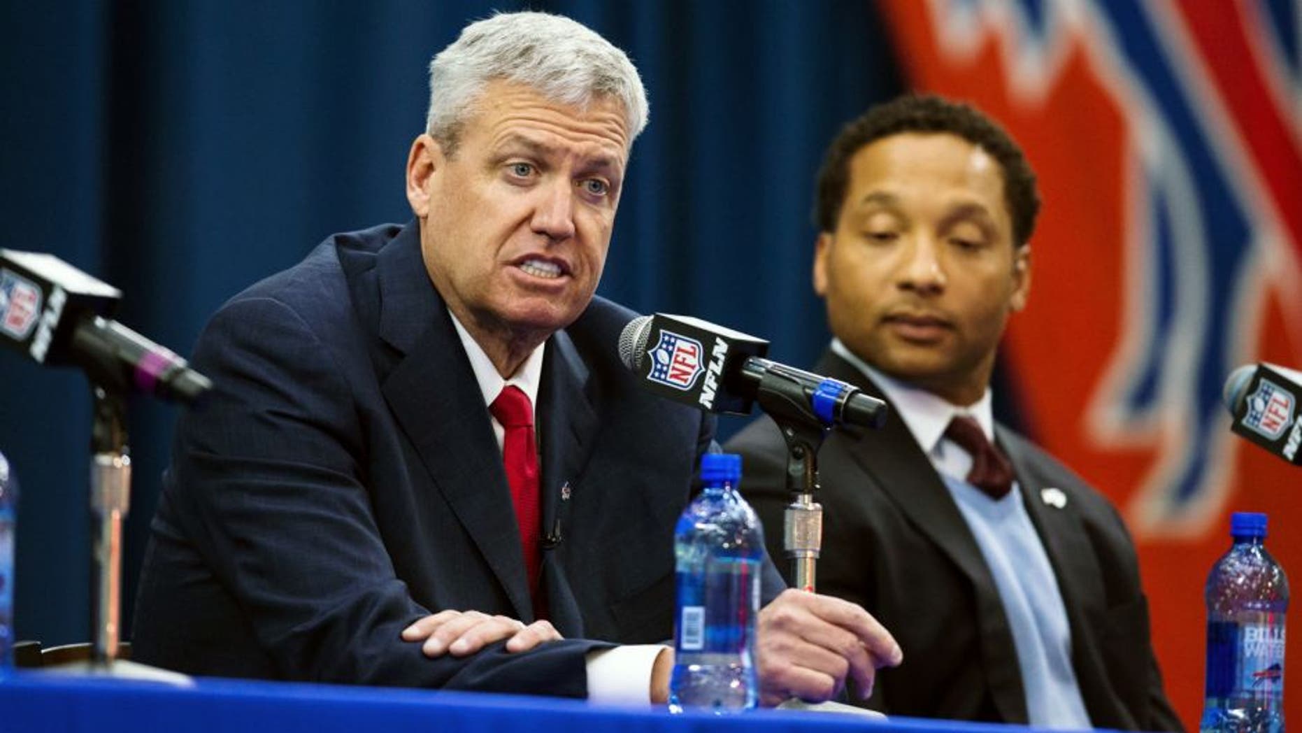 ORCHARD PARK, NY - JANUARY 14: Rex Ryan speaks while manager Doug Whaley (R) listens at a press conference announcing Rex Ryan's arrival as head coach of the Buffalo Bills on January 14, 2015 at Ralph Wilson Stadium in Orchard Park, New York. (Photo by Brett Carlsen/Getty Images)