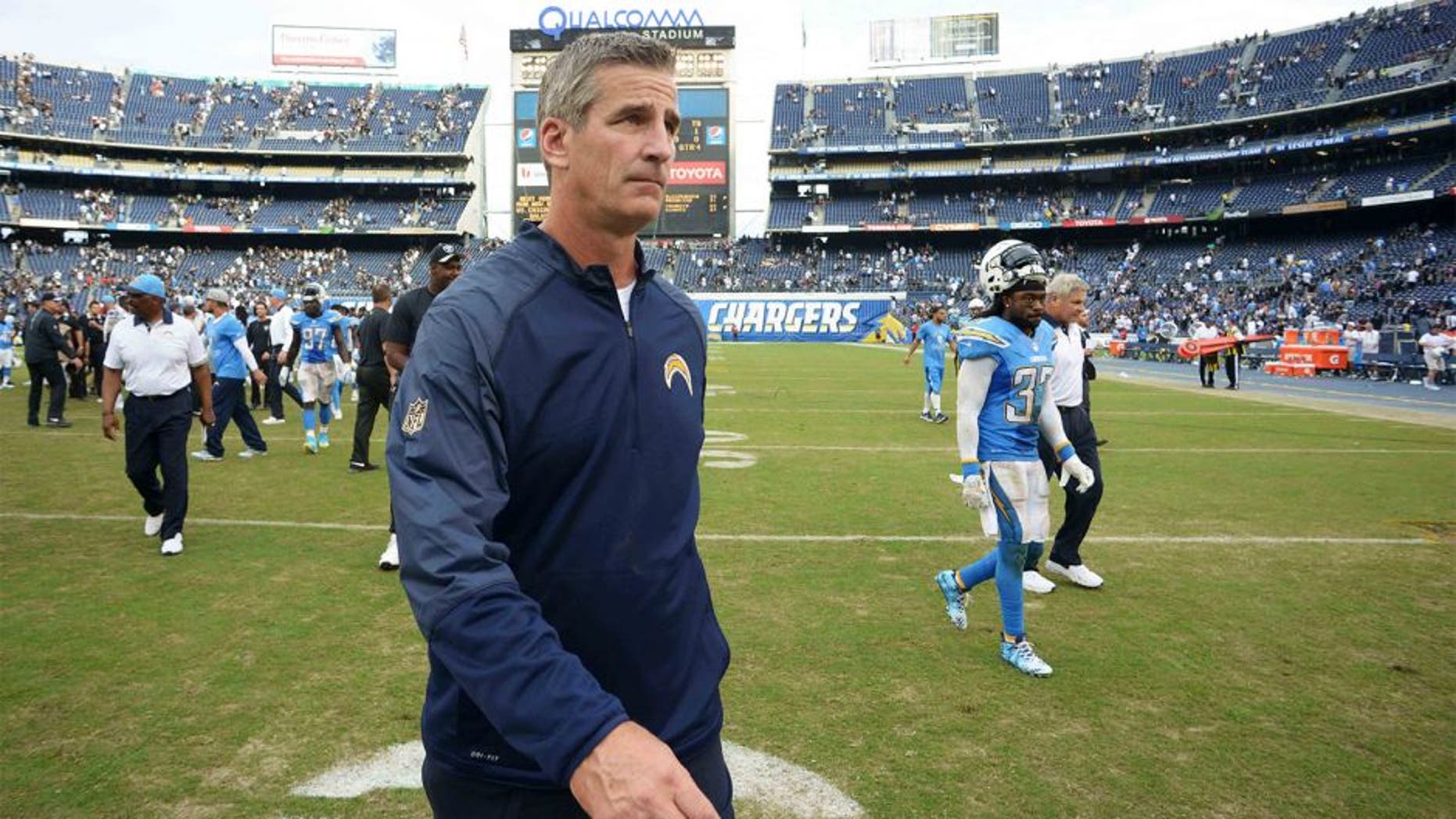 Oct 25, 2015; San Diego, CA, USA; San Diego Chargers offensive coordinator Frank Reich walks off the field after the Chargers lost to the Oakland Raiders 39-27 at Qualcomm Stadium. Mandatory Credit: Jake Roth-USA TODAY Sports