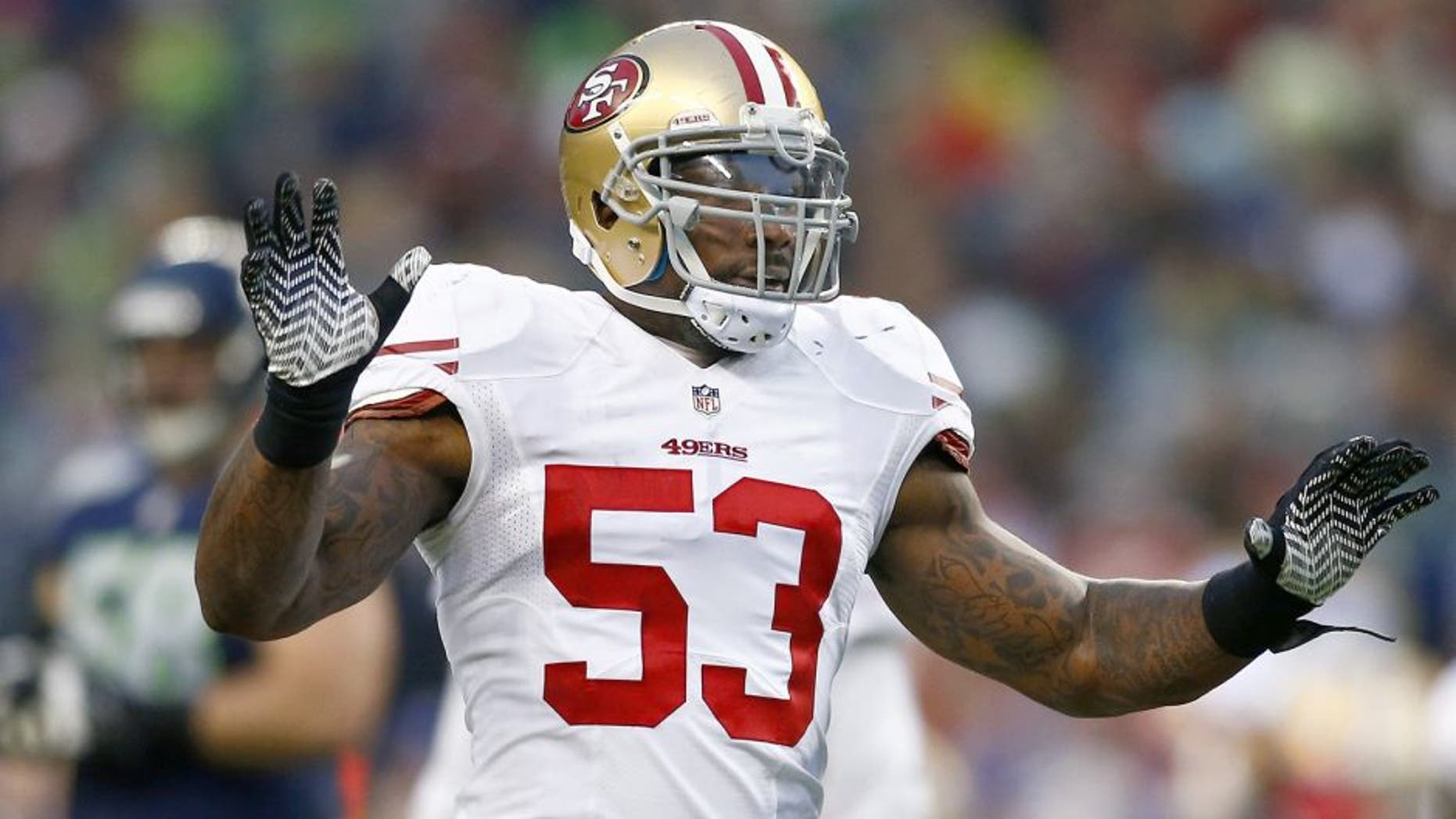 SEATTLE, WA - JANUARY 19: Inside linebacker NaVorro Bowman #53 of the San Francisco 49ers reacts in the first half while taking on the Seattle Seahawks during the 2014 NFC Championship at CenturyLink Field on January 19, 2014 in Seattle, Washington. (Photo by Jonathan Ferrey/Getty Images)