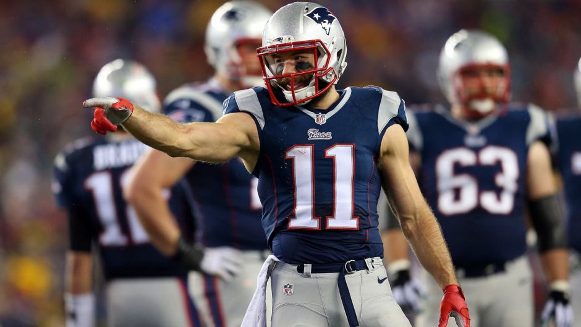FOXBORO, MA - JANUARY 18: Julian Edelman #11 of the New England Patriots reacts after a play in the first quarter against the Indianapolis Colts of the 2015 AFC Championship Game at Gillette Stadium on January 18, 2015 in Foxboro, Massachusetts. (Photo by Jim Rogash/Getty Images)
