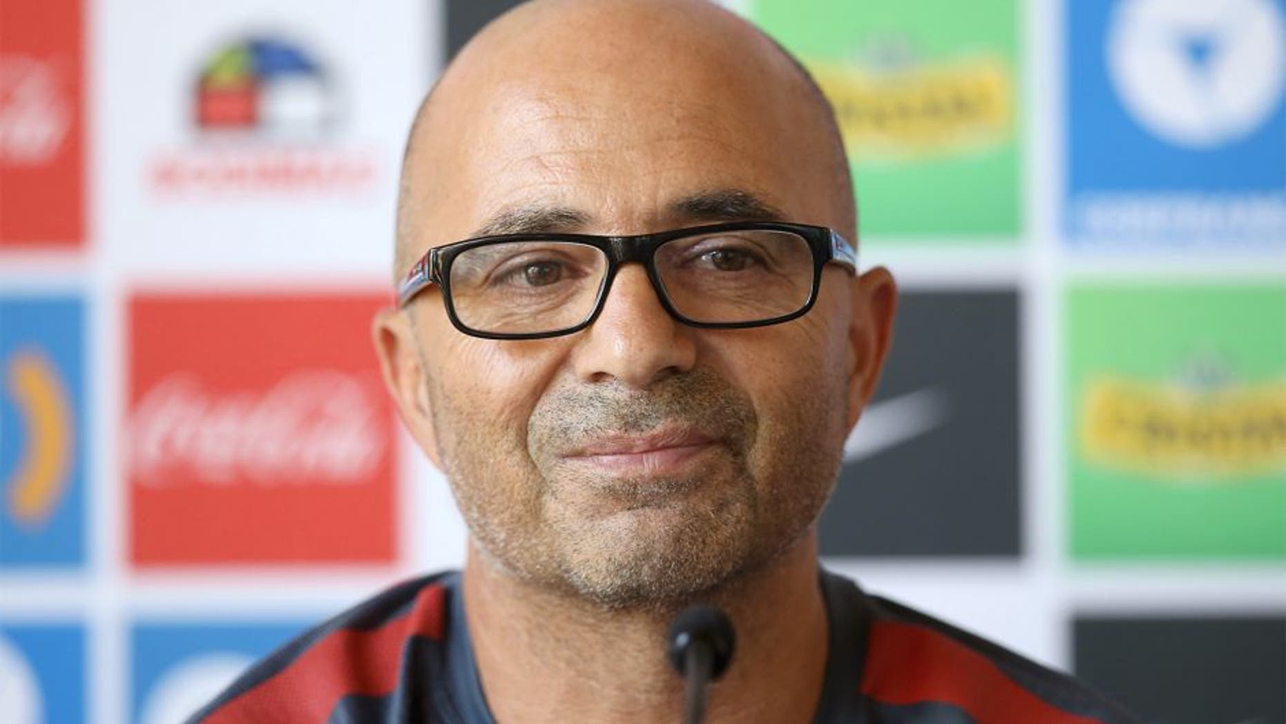 Chilean national football team, Argentinian Jorge Sampaoli, gestures as he speaks during a press conference in Santiago, Chile, on January 13, 2016. Chile coach Jorge Sampoali appears on the verge of quitting six months after guiding La Roja to the Copa America, with the Argentine claiming he is being held "hostage" by the federation. AFP PHOTO/CLAUDIO REYES / AFP / Claudio Reyes (Photo credit should read CLAUDIO REYES/AFP/Getty Images)