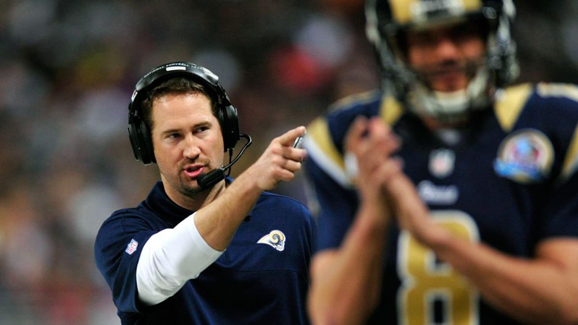 Dec 16, 2012; St. Louis, MO, USA; St. Louis Rams offensive coordinator Brian Schottenheimer points to the bench during the second half against the Minnesota Vikings at the Edward Jones Dome. Minnesota defeated St. Louis 36-22. Mandatory Credit: Jeff Curry-USA TODAY Sports