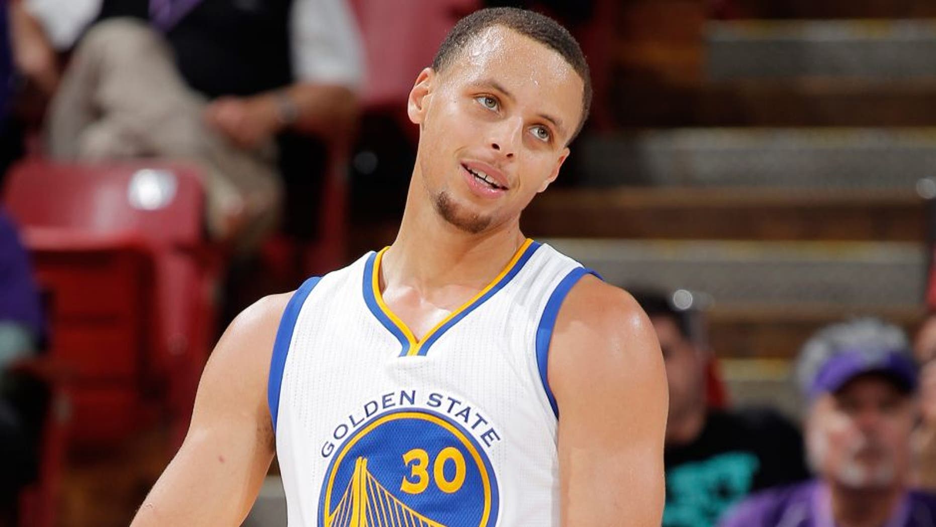 SACRAMENTO, CA - OCTOBER 29: Stephen Curry #30 of the Golden State Warriors stands on the court during the game against the Sacramento Kings on October 29, 2014 at Sleep Train Arena in Sacramento, California. NOTE TO USER: User expressly acknowledges and agrees that, by downloading and or using this photograph, User is consenting to the terms and conditions of the Getty Images Agreement. Mandatory Copyright Notice: Copyright 2014 NBAE (Photo by Rocky Widner/NBAE via Getty Images)