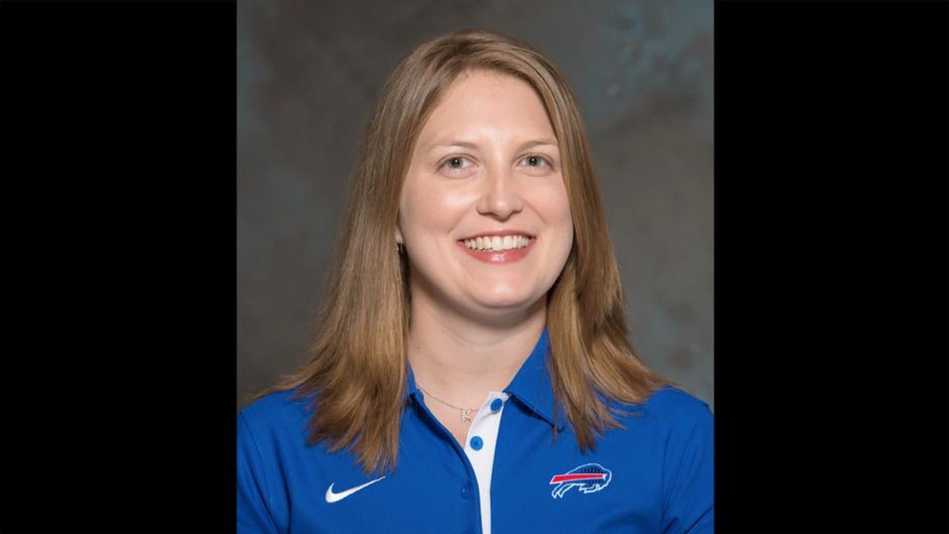 FILE - A May 2015 photo shows Kathryn Smith of the Buffalo Bills NFL football team. The Bills promoted Smith to be their special teams quality control coach, making her the first full-time female member of an NFL coaching staff. The team announced the move in a release Wednesday night, Jan. 20, 2016. Smith was an administrative assistant this season for Bills assistant coaches under Rex Ryan, with whom she has worked for seven years. (AP Photo/File)