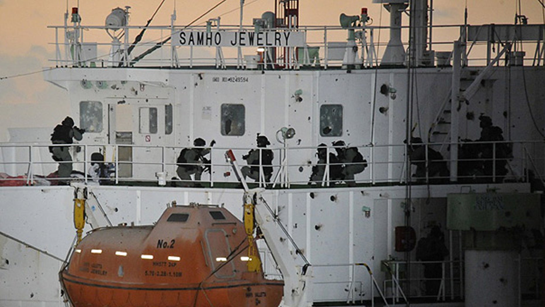 Jan. 21: South Korean naval special forces prepare to rescue crew members from Somali pirates on cargo ship Samho Jewelry in the Arabian Sea.