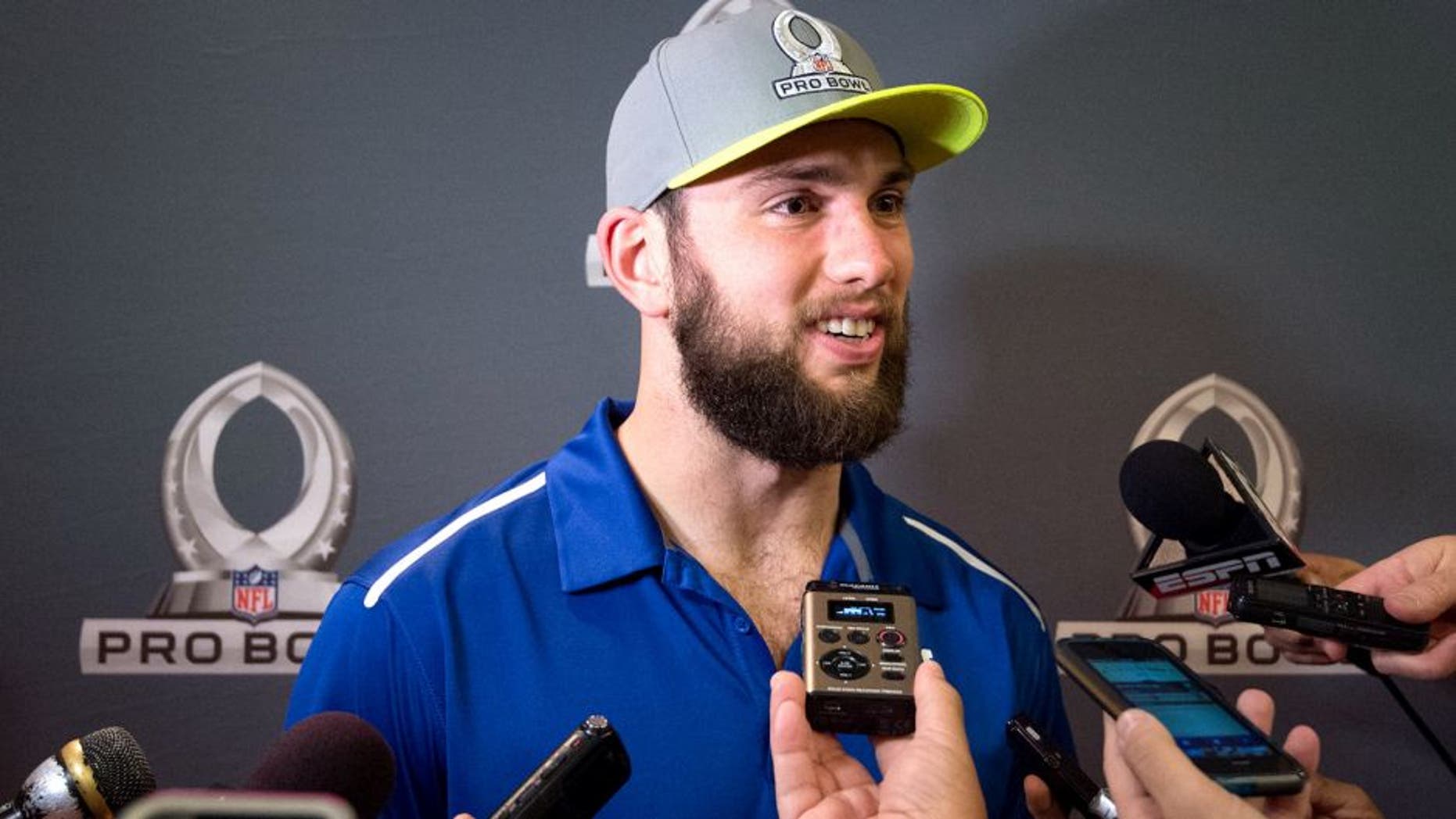 Jan 21, 2015; Phoenix, AZ, USA; Indianapolis Colts quarterback Andrew Luck (12) addresses the media after being selected first overall by Team Carter during the Pro Bowl Draft at The Arizona Biltmore. Mandatory Credit: Kyle Terada-USA TODAY Sports