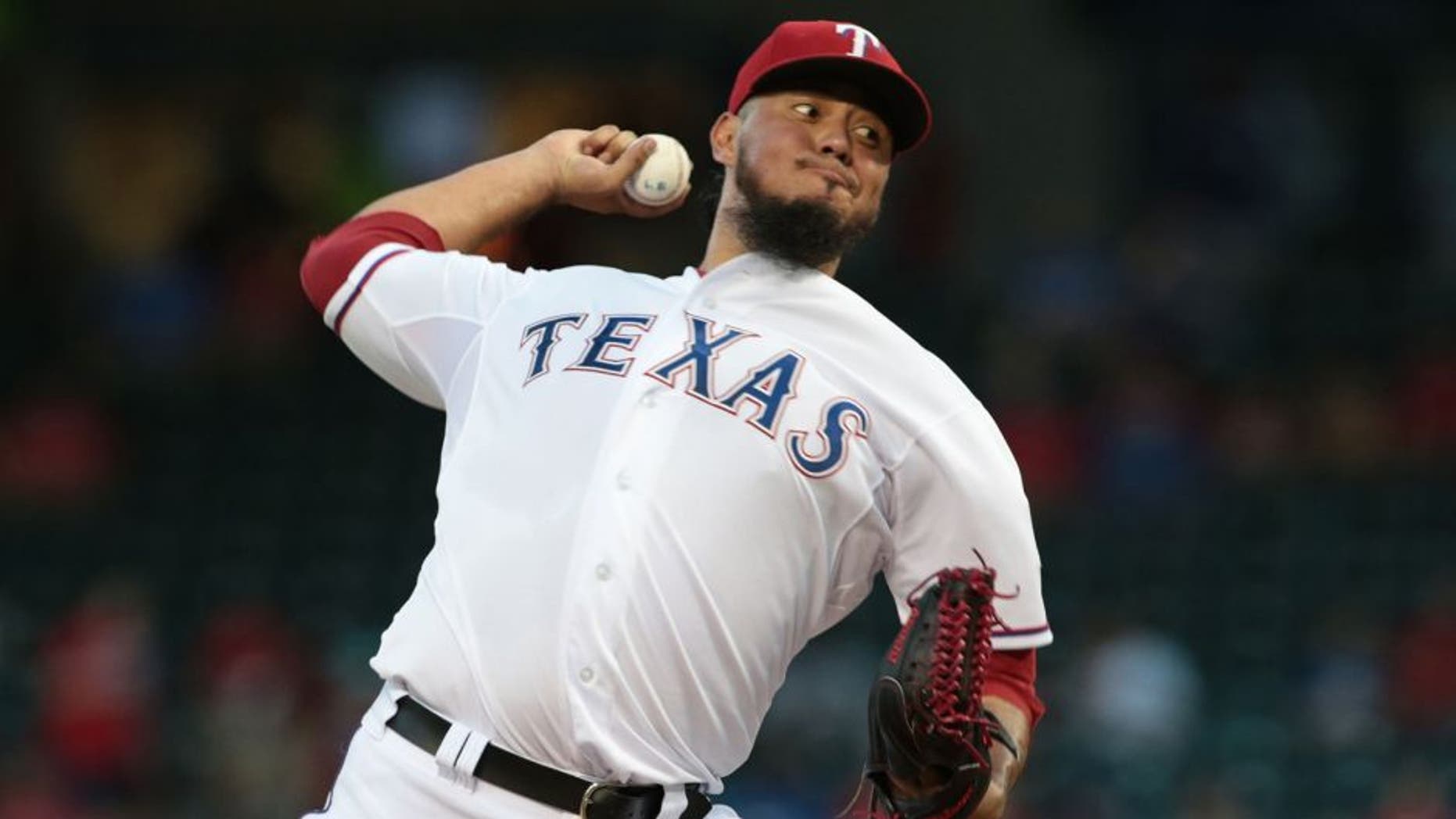 ARLINGTON, TX - SEPTEMBER 18: Yovani Gallardo #49 of the Texas Rangers throws in the first inning Seattle Mariners at Global Life Park in Arlington on September 18, 2015 in Arlington, Texas. (Photo by Rick Yeatts/Getty Images)