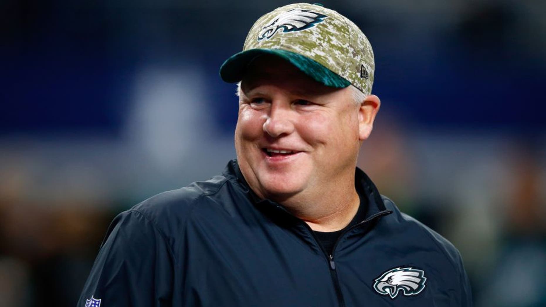 ARLINGTON, TX - NOVEMBER 08: Head coach Chip Kelly of the Philadelphia Eagles talks with players during warm-ups prior to the game against the Dallas Cowboys on November 8, 2015 in Arlington, Texas. (Photo by Jamie Squire/Getty Images)