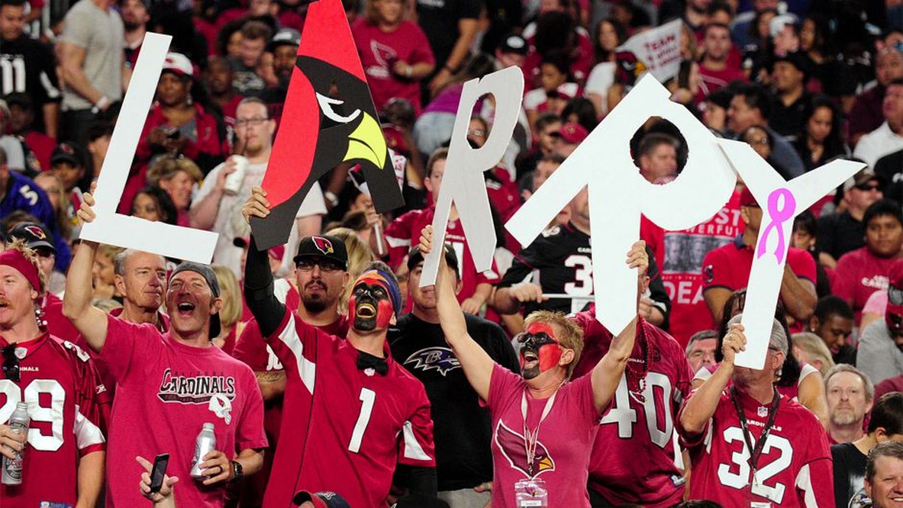 Oct 26, 2015; Glendale, AZ, USA; Arizona Cardinals fans cheers during the second half against the Baltimore Ravens at University of Phoenix Stadium. Mandatory Credit: Matt Kartozian-USA TODAY Sports