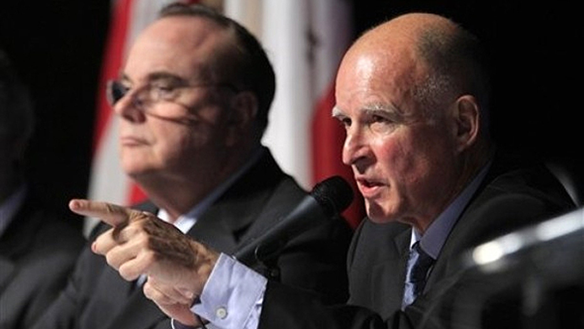 Dec. 8: Gov.-elect Jerry Brown, right, points to a member of the audience for a question as Treasurer Bill Lockyer looks on at Brown's budget briefing in Sacramento, Calif.