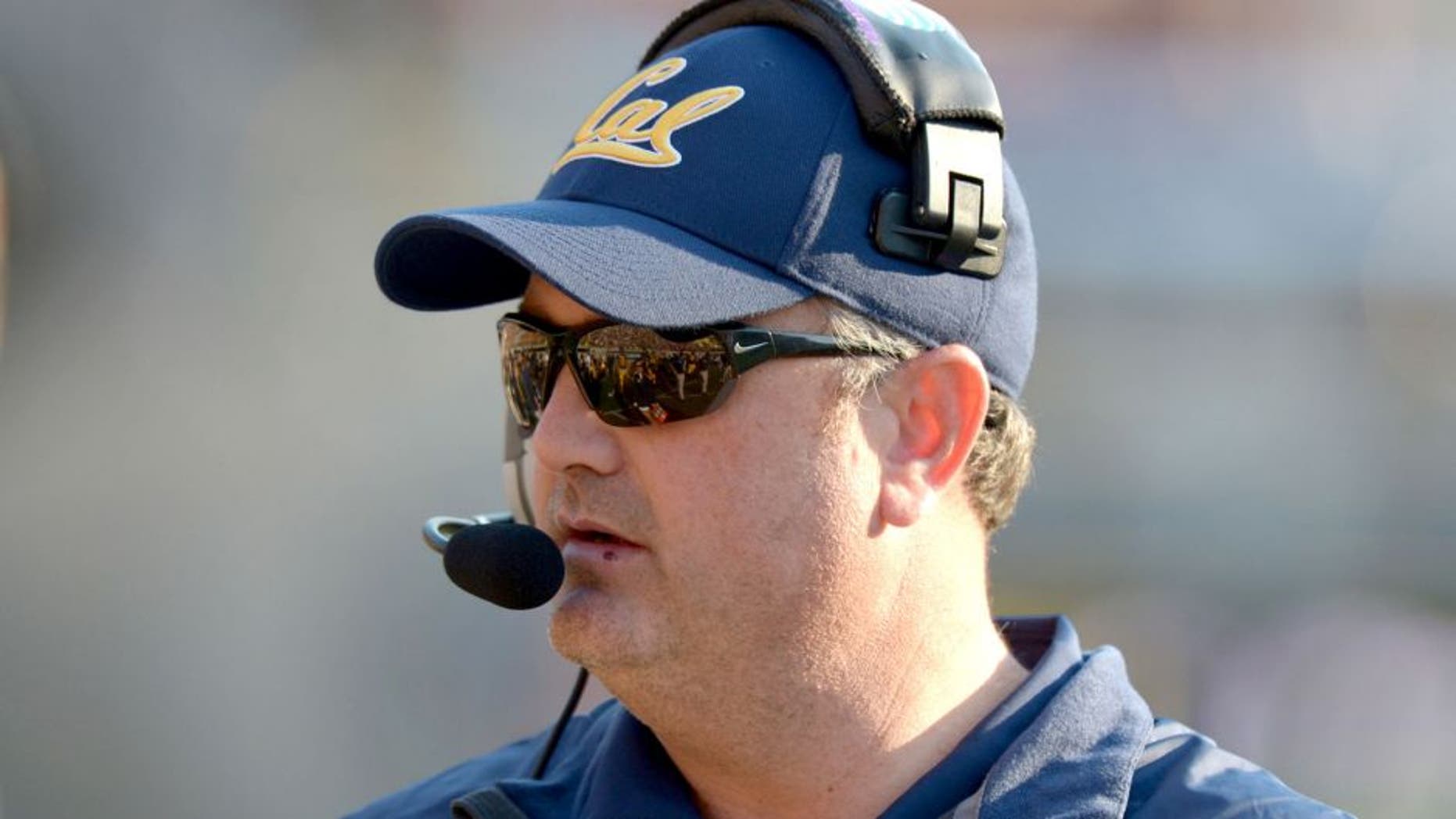 Nov 9, 2013; Berkeley, CA, USA; California Golden Bears coach Sonny Dykes reacts during the game against the Southern California Trojans at Memorial Stadium. USC defeated California 62-28. Mandatory Credit: Kirby Lee-USA TODAY Sports