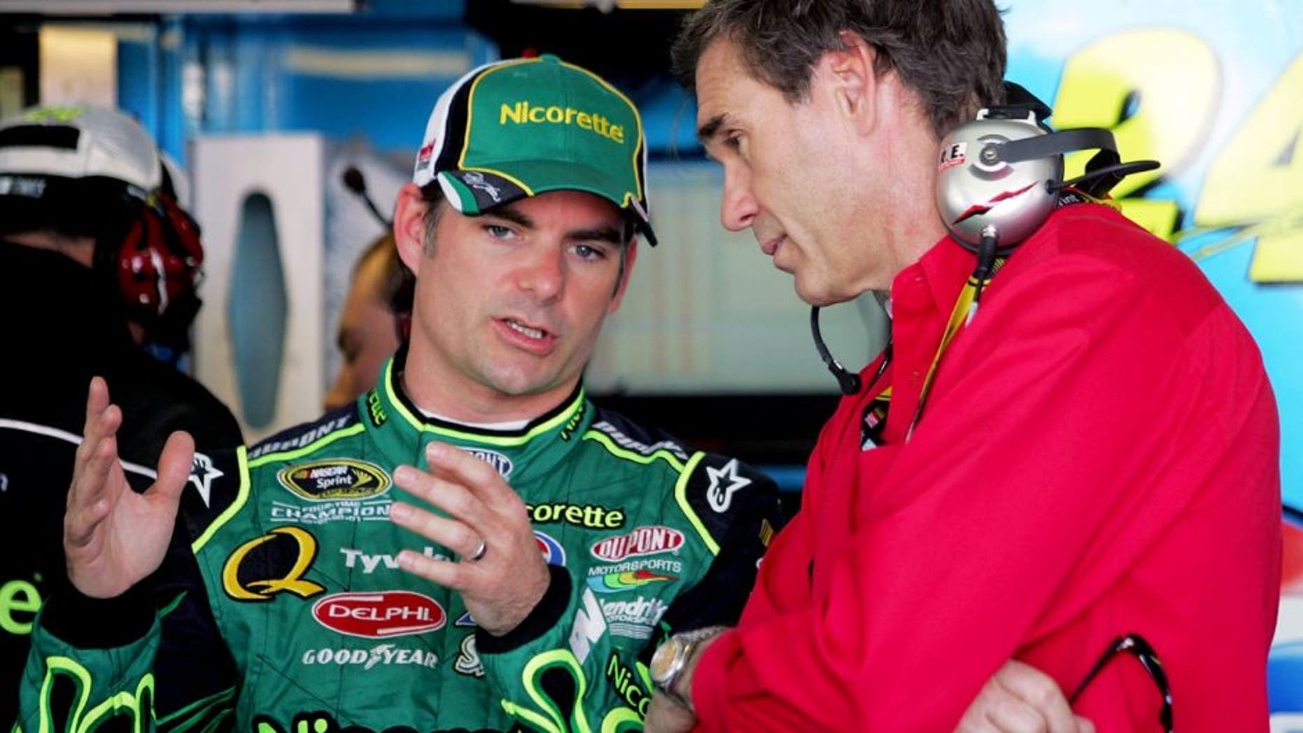 AVONDALE, AZ - APRIL 10: (L-R) Jeff Gordon, driver of the #24 Dupont/Nicorette Chevrolet, talks with Ray Evernham, NASCAR team owner for Gillett Evernham Motorsports, during practice for the NASCAR Sprint Cup Series Subway Fresh Fit 500 at Phoenix International Raceway on April 10, 2008 in Avondale, Arizona. (Photo by Todd Warshaw/Getty Images for NASCAR)