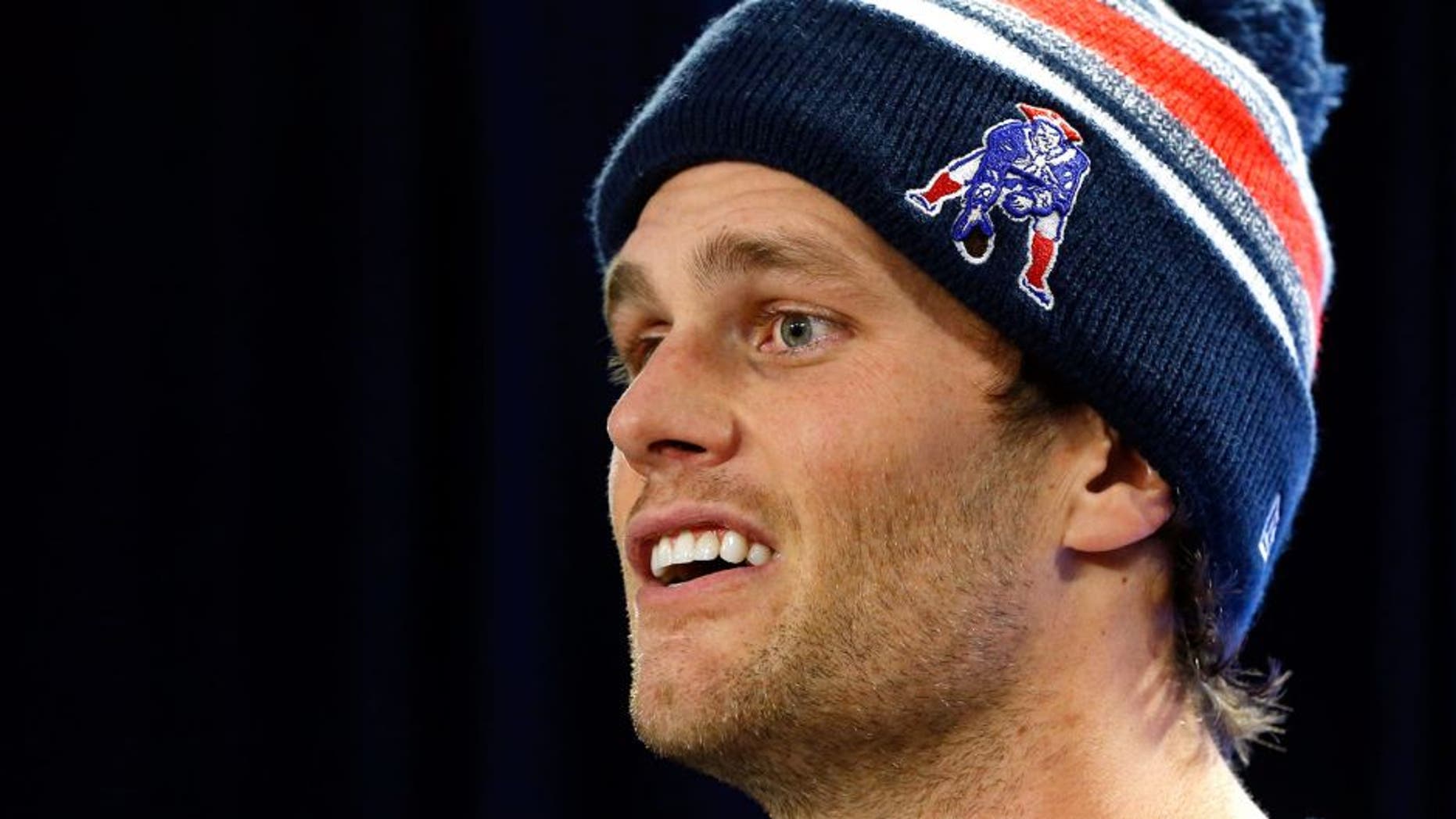 New England Patriots quarterback Tom Brady speaks at a news conference in Foxborough, Mass., Thursday, Jan. 22, 2015. Brady said Thursday that he did not know how New England ended up using underinflated balls in its win Sunday against the Indianapolis Colts in the AFC Championship game. (AP Photo/Elise Amendola)