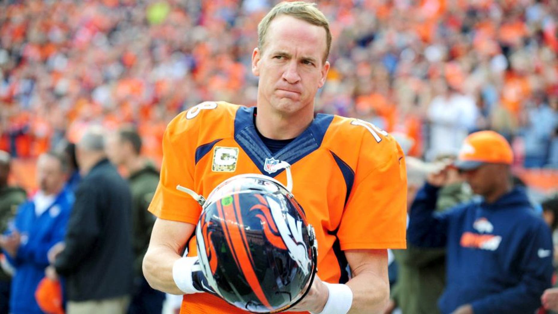 Nov 15, 2015; Denver, CO, USA; Denver Broncos quarterback Peyton Manning (18) before the game against the Kansas City Chiefs at Sports Authority Field at Mile High. Mandatory Credit: Ron Chenoy-USA TODAY Sports