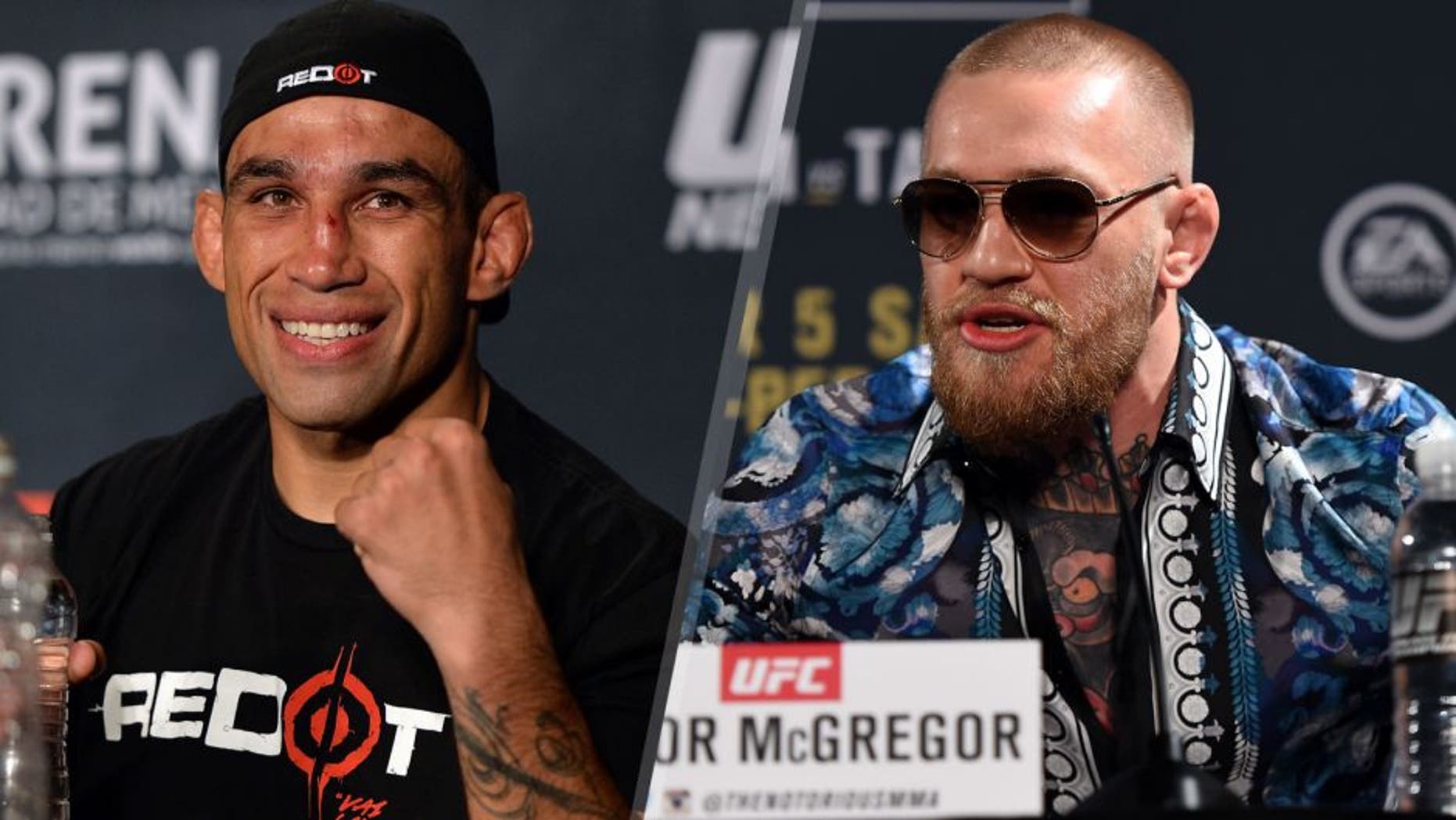 MEXICO CITY, MEXICO - JUNE 13: UFC heavyweight champion Fabricio Werdum of Brazil interacts with the media during the UFC 188 post fight press conference inside the Arena Ciudad de Mexico on June 13, 2015 in Mexico City, Mexico. (Photo by Jeff Bottari/Zuffa LLC/Zuffa LLC via Getty Images) LAS VEGAS, NV - JANUARY 20: UFC featherweight champion Conor McGregor of Ireland interacts with the crowd during the UFC 197 on-sale press conference event inside MGM Grand Hotel & Casino on January 20, 2016 in Las Vegas, Nevada. (Photo by Jeff Bottari/Zuffa LLC/Zuffa LLC via Getty Images)