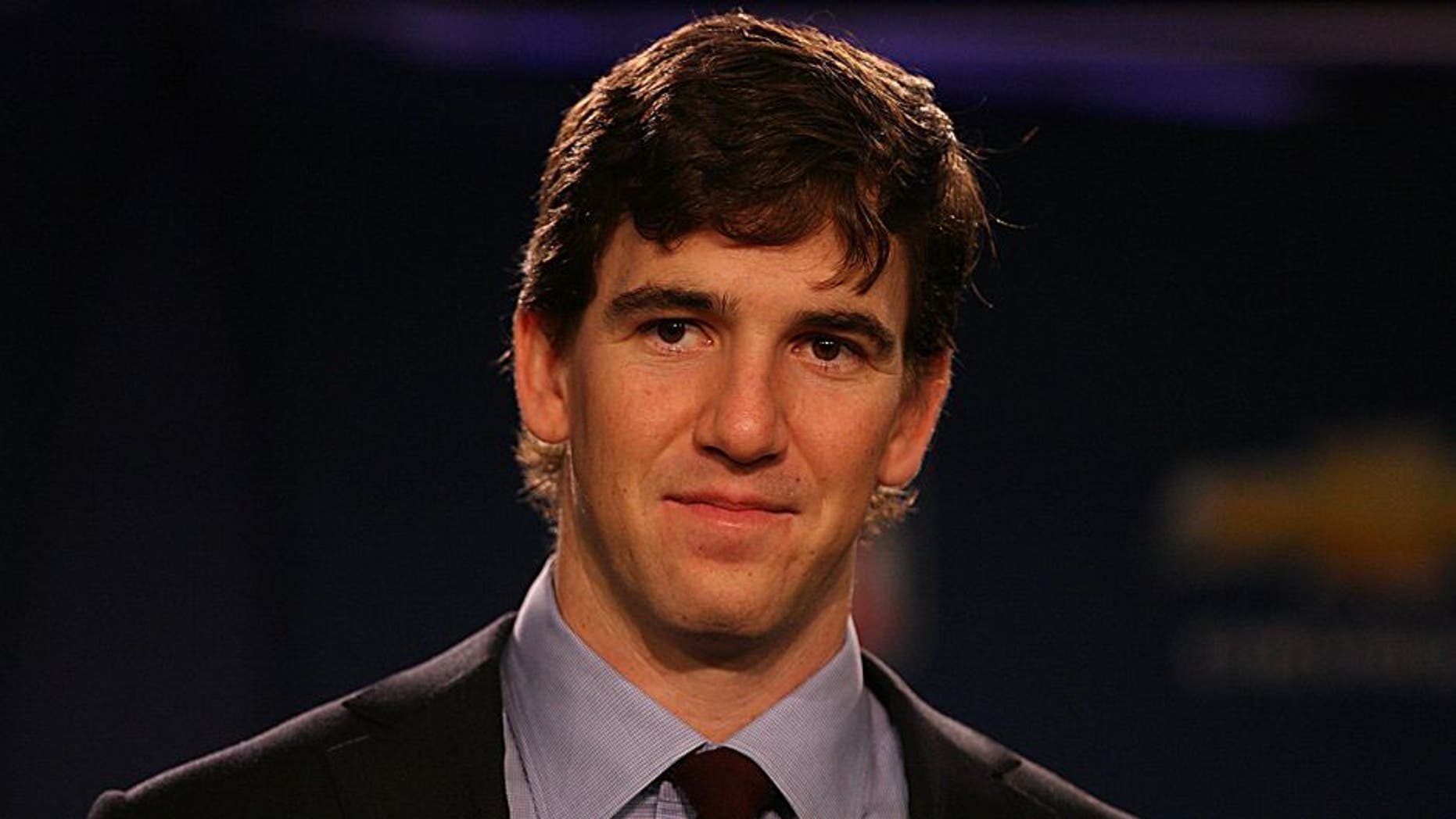Feb 6, 2012; Indianapolis, IN, USA; New York Giants quarterback Eli Manning during the Super Bowl most valuable player and winning head coach press conference at the Super Bowl XLVI media center at the J.W. Marriott. Mandatory Credit: Brian Spurlock-USA TODAY Sports