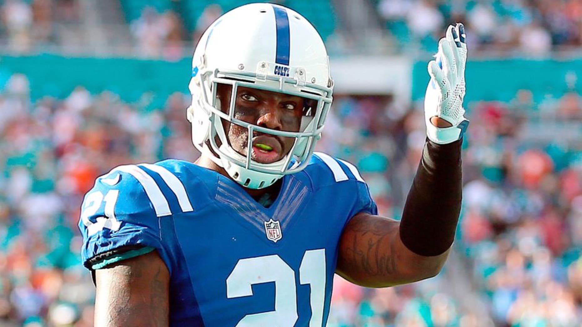 Dec 27, 2015; Miami Gardens, FL, USA; Indianapolis Colts cornerback Vontae Davis (21) waves to the crowd during the second half against the Miami Dolphins at Sun Life Stadium. The Colts won 18-12. Mandatory Credit: Steve Mitchell-USA TODAY Sports