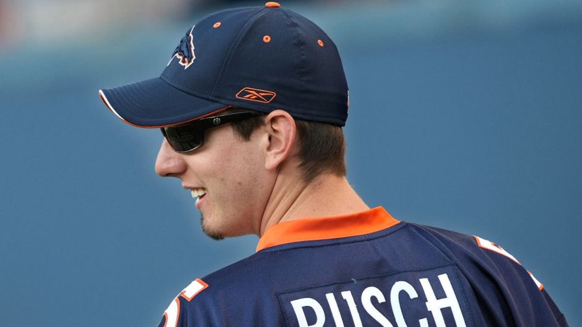 DENVER - AUGUST 30: NASCAR driver Kyle Busch of Las Vegas, Nevada checks out the pregame action on the field prior to the Arizona Cardinals meeting the Denver Broncos during NFL preseason action at Invesco Field August 30, 2007 in Denver, Colorado. (Photo by Doug Pensinger/Getty Images) *** Local Caption *** Kyle Busch