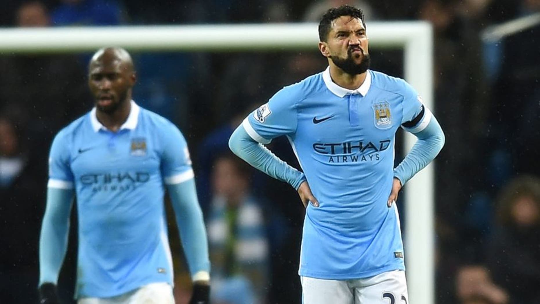 MANCHESTER, ENGLAND - DECEMBER 12: Gael Clichy of Manchester City shows dejection after conceding the first goal to Swansea during the Barclays Premier League match between Manchester City and Swansea City at Etihad Stadium on December 12, 2015 in Manchester, United Kingdom. (Photo by Michael Regan/Getty Images)