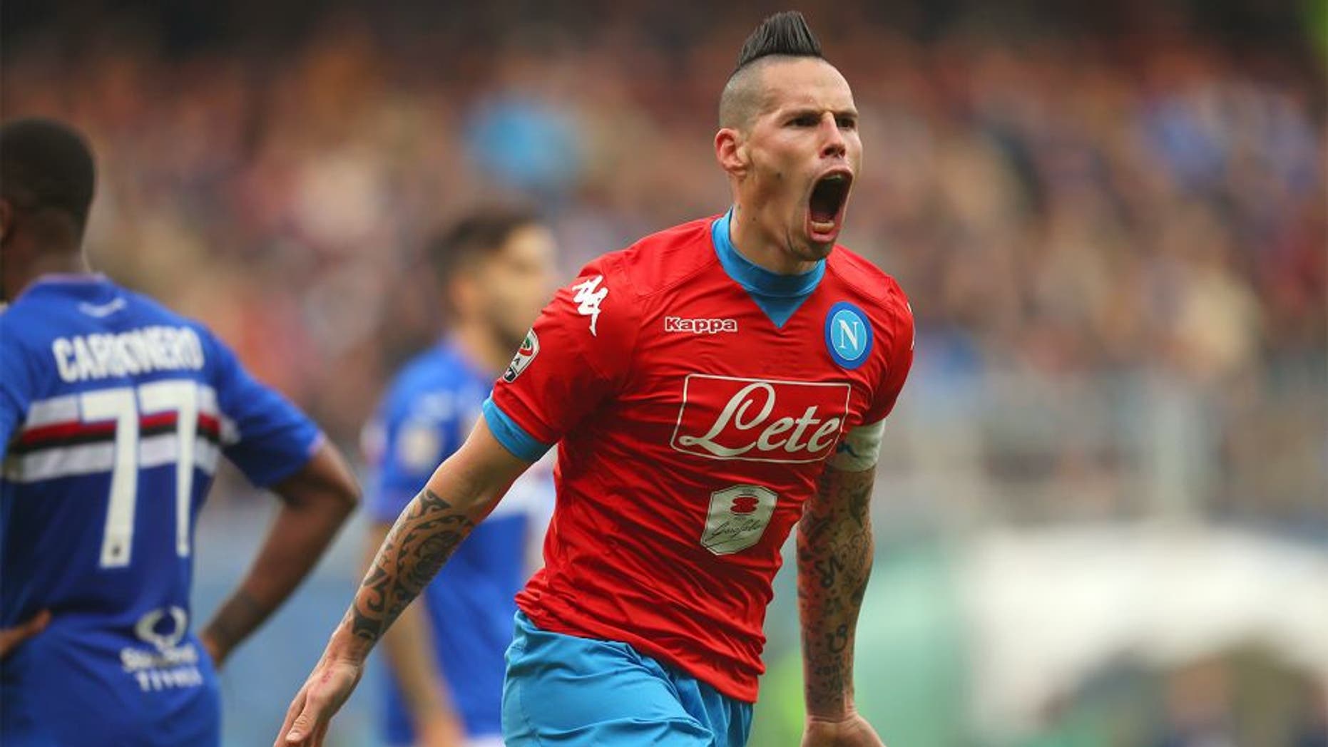 Napoli's midfielder Marek Hamsik from Slovakia celebrates after scoring during the Italian Serie A football match Sampdoria Vs Napoli on January 24, 2016 at 'Luigi Ferraris Stadium' in Genoa. AFP PHOTO / MARCO BERTORELLO / AFP / MARCO BERTORELLO (Photo credit should read MARCO BERTORELLO/AFP/Getty Images)
