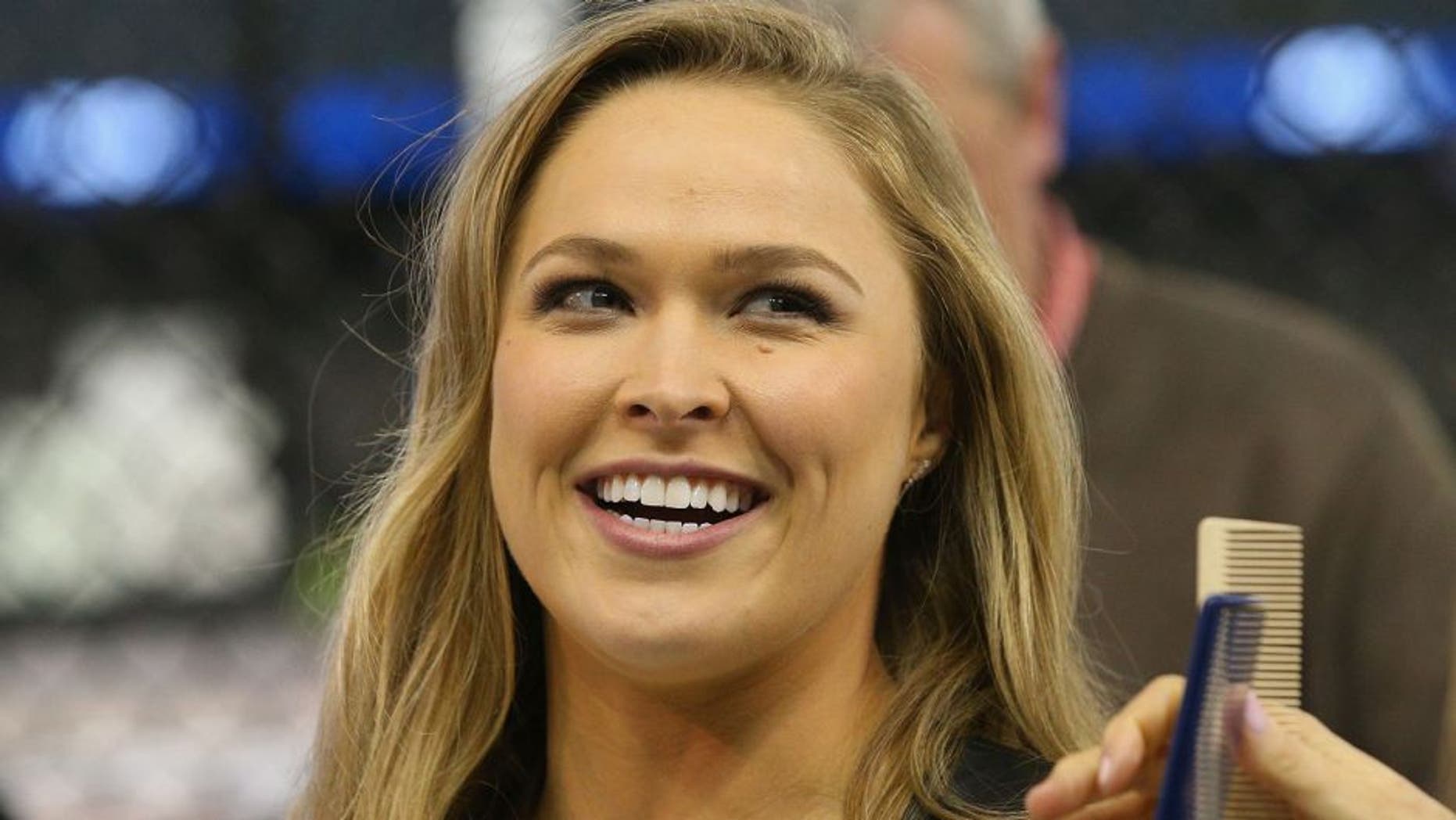 MELBOURNE, AUSTRALIA - SEPTEMBER 16: Ronda Rousey, UFC Women's Bantamweight Champion, reacts during the UFC 193 media event at Etihad Stadium on September 16, 2015 in Melbourne, Australia. (Photo by Michael Dodge/Zuffa LLC/Zuffa LLC via Getty Images)