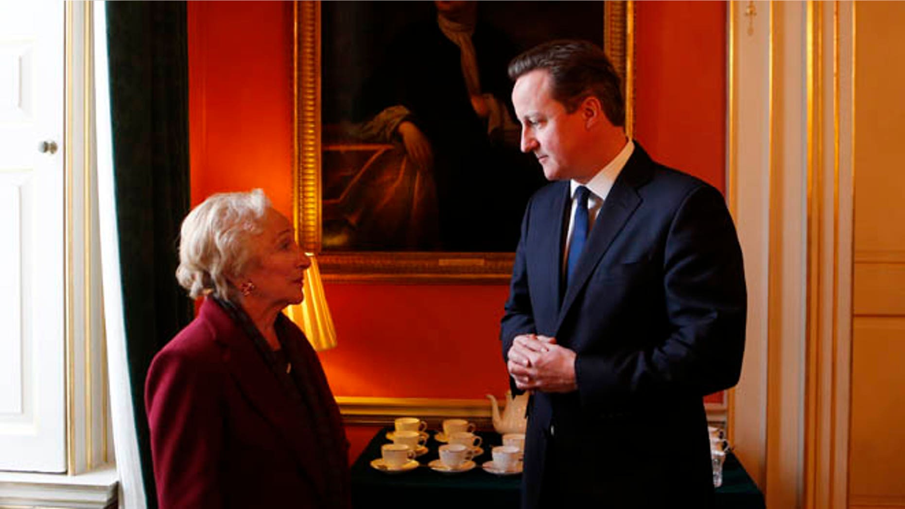Jan. 21, 2013: British Prime Minister David Cameron talks with Holocaust survivor Freda Wineman ahead of Holocaust Memorial Day at 10 Downing Street in London.