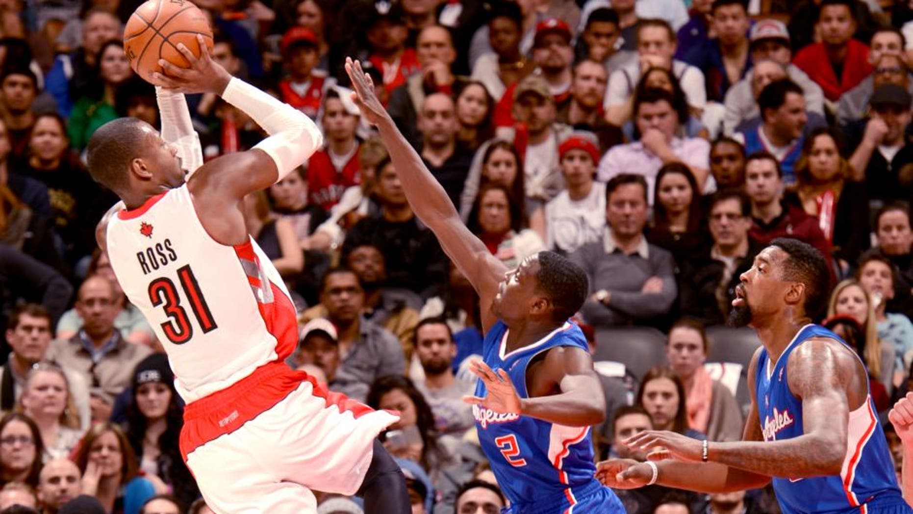 TORONTO, CANADA - January 25: Terrence Ross #31 of the Toronto Raptors shoots against the Los Angeles Clippers on January 25, 2014 at the Air Canada Centre in Toronto, Ontario, Canada. NOTE TO USER: User expressly acknowledges and agrees that, by downloading and or using this Photograph, user is consenting to the terms and conditions of the Getty Images License Agreement. Mandatory Copyright Notice: Copyright 2014 NBAE (Photo by Ron Turenne/NBAE via Getty Images)