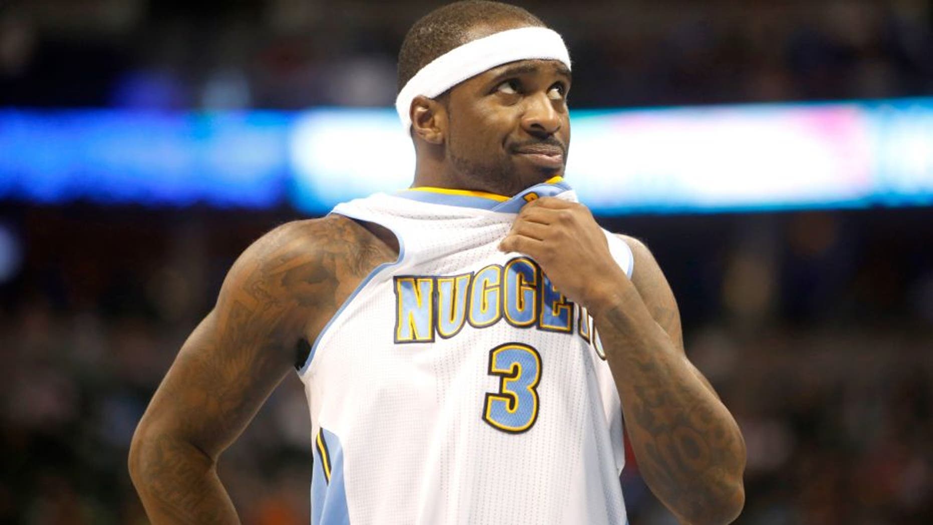 Jan 25, 2015; Denver, CO, USA; Denver Nuggets guard Ty Lawson (3) reacts during the second half against the Washington Wizards at Pepsi Center. The Wizards won 117-115. Mandatory Credit: Chris Humphreys-USA TODAY Sports