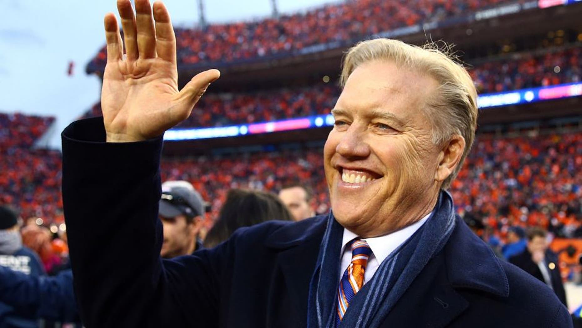 Jan 24, 2016; Denver, CO, USA; Denver Broncos general manager John Elway celebrates after defeating the Denver Broncos in the AFC Championship football game at Sports Authority Field at Mile High. Mandatory Credit: Mark J. Rebilas-USA TODAY Sports
