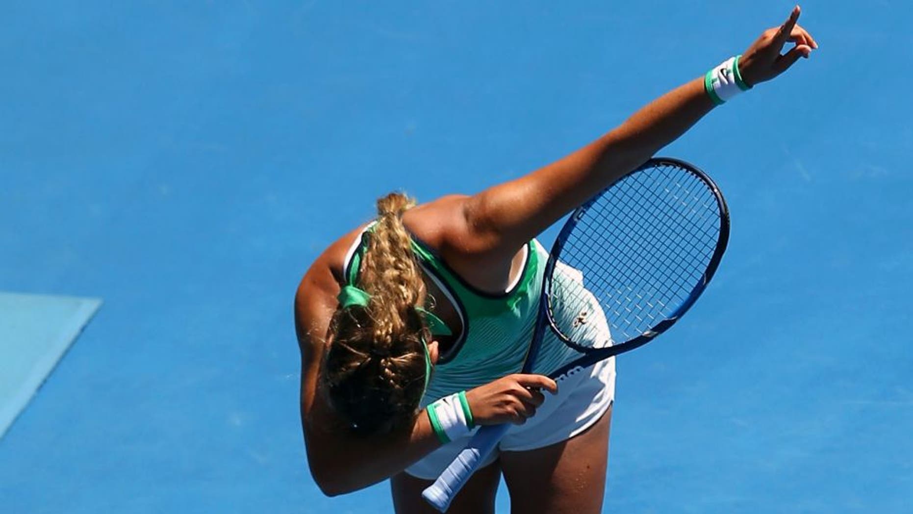 MELBOURNE, AUSTRALIA - JANUARY 25: Victoria Azarenka of Belarus celebrates winning her fourth round match against Barbora Strycova of the Czech Republic during day eight of the 2016 Australian Open at Melbourne Park on January 25, 2016 in Melbourne, Australia. (Photo by Mark Kolbe/Getty Images)