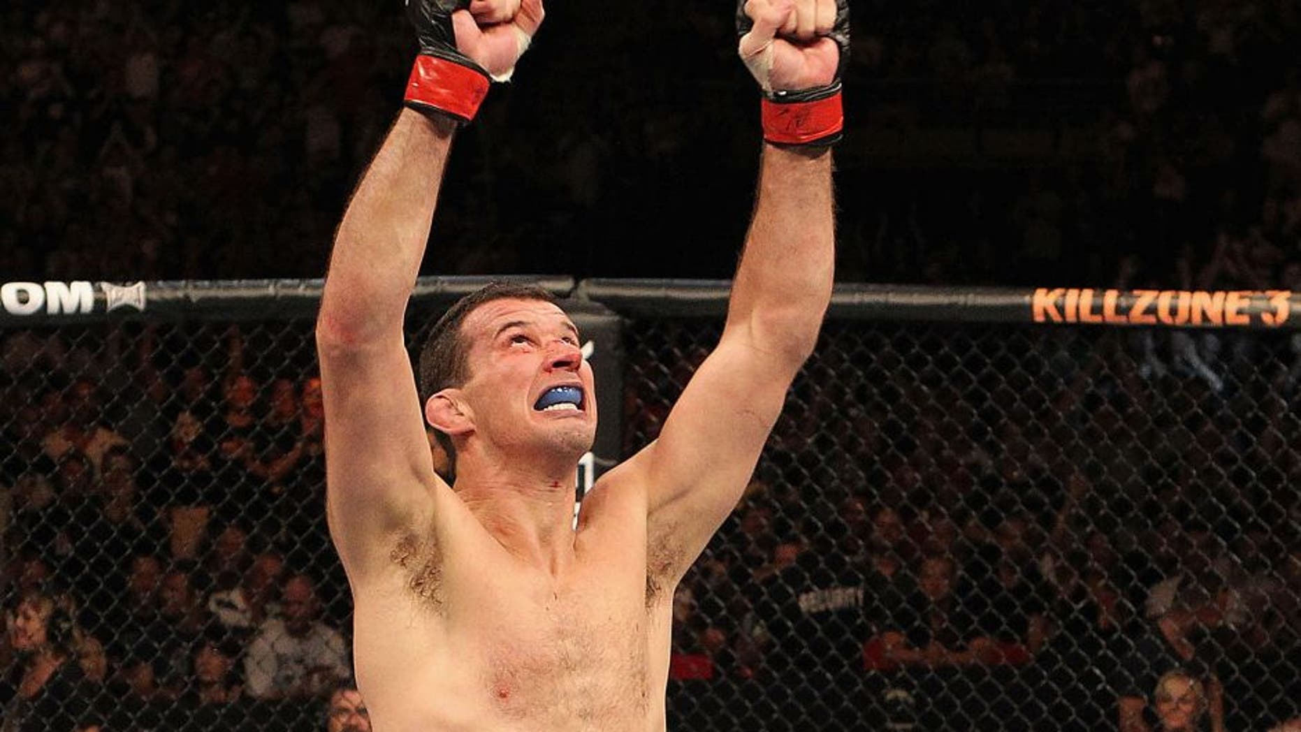 SYDNEY, AUSTRALIA - FEBRUARY 27: Anthony Perosh of Australia celebrates after winning by submission over Tom Blackledge of England during their Light-Heavyweight bout at UFC 127 at Acer Arena on February 27, 2011 in Sydney, Australia. (Photo by Josh Hedges/Zuffa LLC/Zuffa LLC via Getty Images ) *** Local Caption *** Anthony Perosh