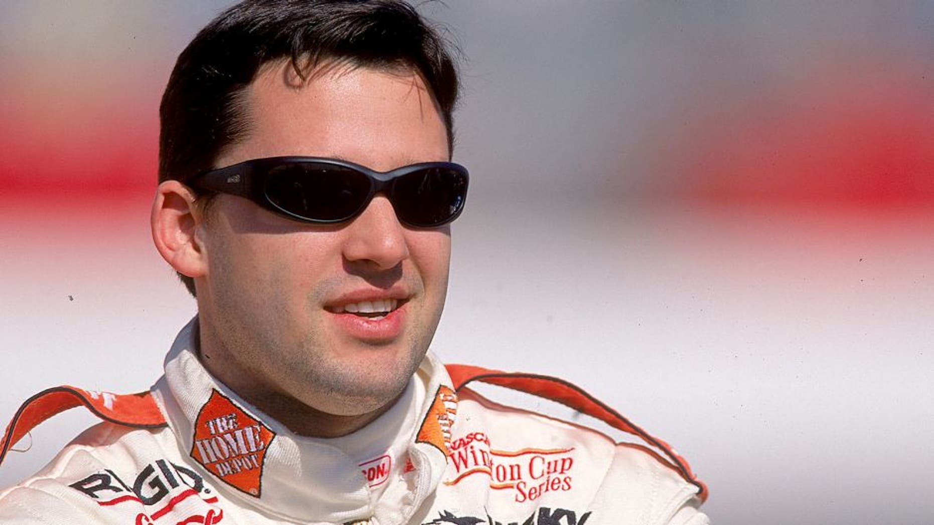 12 Mar 1999: Tony Stewart #20 looks on the track during the Cracker Barrel 500, part of the NASCAR Winston Cup Series at the Atlanta Motor Speedway in Hampton, Georgia. Mandatory Credit: Jon Ferrey /Allsport