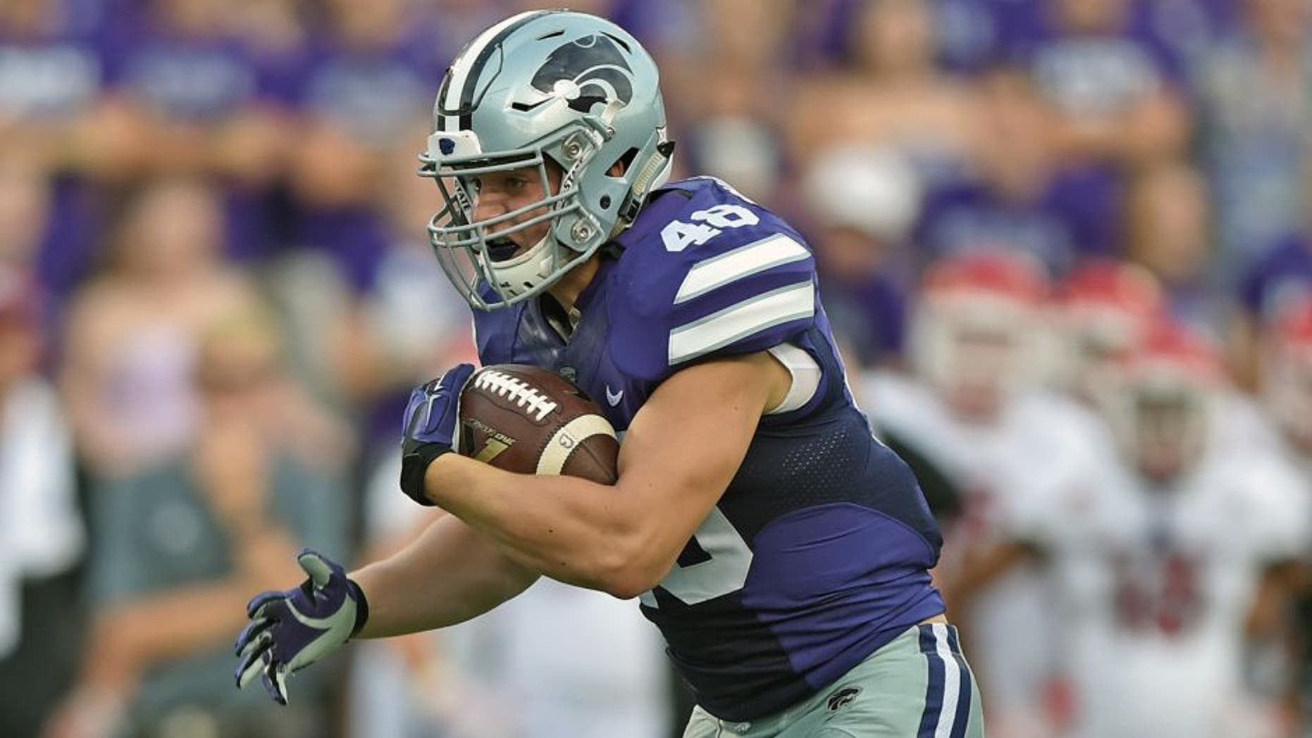 MANHATTAN, KS - SEPTEMBER 05: Full back Glenn Gronkowski #48 of the Kansas State Wildcats runs up field against the South Dakota Coyotes during the first half on September 5, 2015 at Bill Snyder Family Stadium in Manhattan, Kansas. (Photo by Peter G. Aiken/Getty Images)