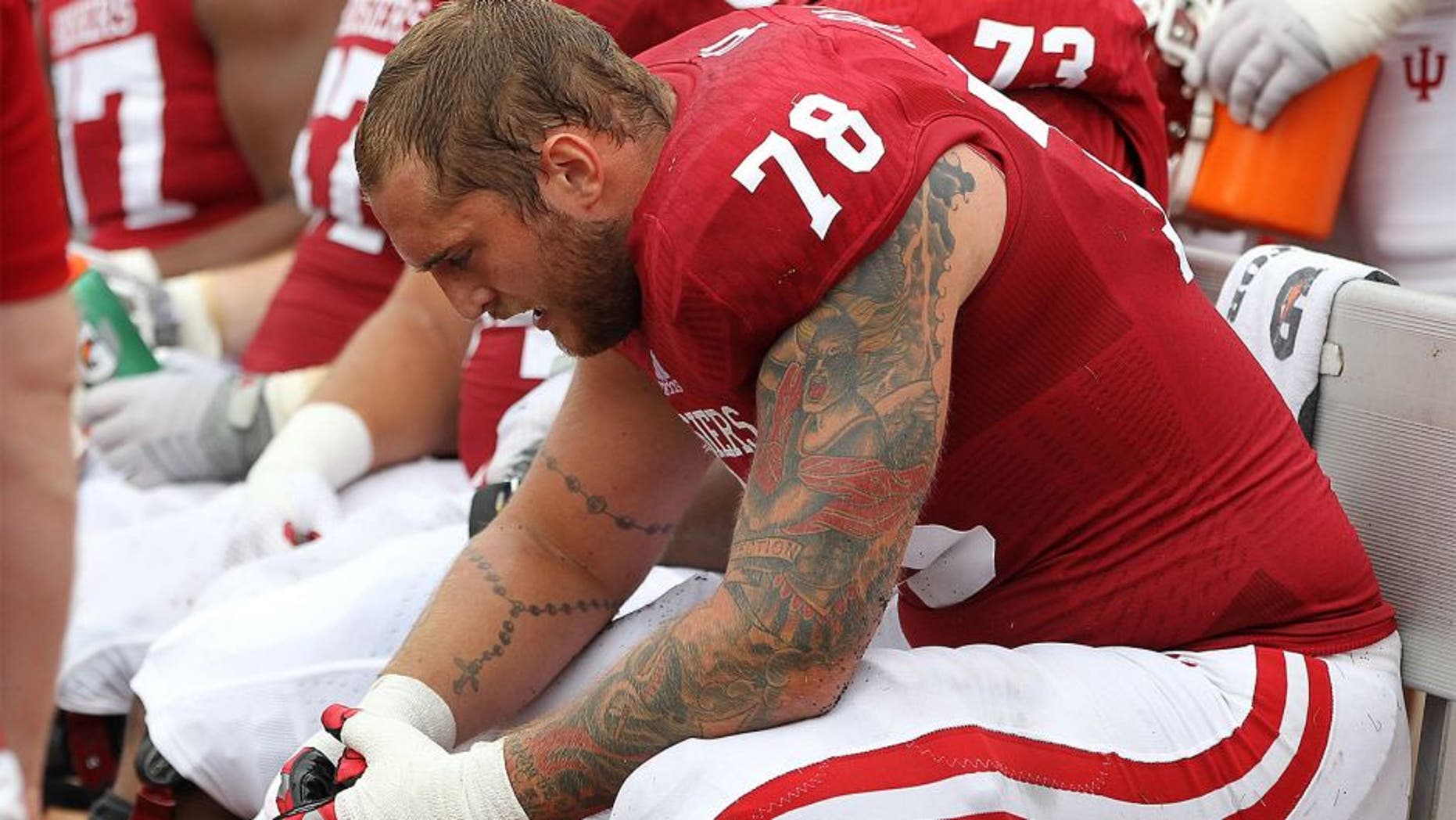 Aug 30, 2014; Bloomington, IN, USA; Indiana Hoosiers offensive tackle Jason Spriggs (78) on the bench during the third quarter against the Indiana State Sycamores at Memorial Stadium. Indiana won 28-10. Mandatory Credit: Pat Lovell-USA TODAY Sports