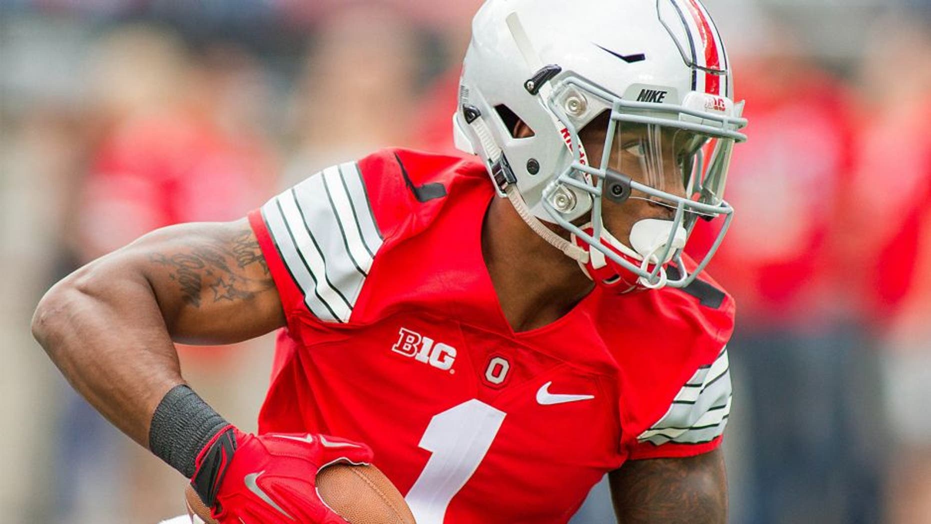 Sep 12, 2015; Columbus, OH, USA; Ohio State Buckeyes wide receiver Braxton Miller (1) warms up before the game against the Hawaii Warriors at Ohio Stadium. The Ohio State Buckeyes beat the Hawaii Warriors by the score of 38-0. Mandatory Credit: Trevor Ruszkowski-USA TODAY Sports