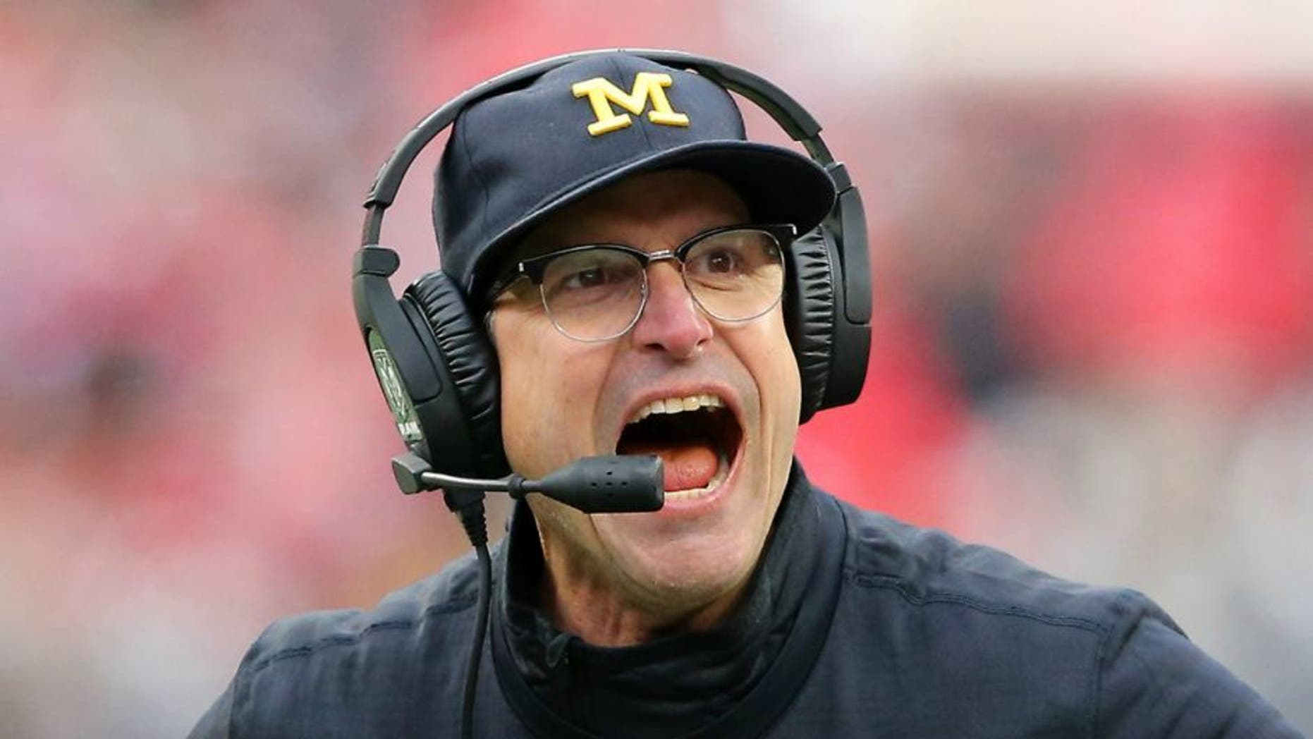 Nov 26, 2016; Columbus, OH, USA; Michigan Wolverines head coach Jim Harbaugh reacts during the third quarter against the Ohio State Buckeyes at Ohio Stadium. Ohio State won 30-27. Mandatory Credit: Joe Maiorana-USA TODAY Sports