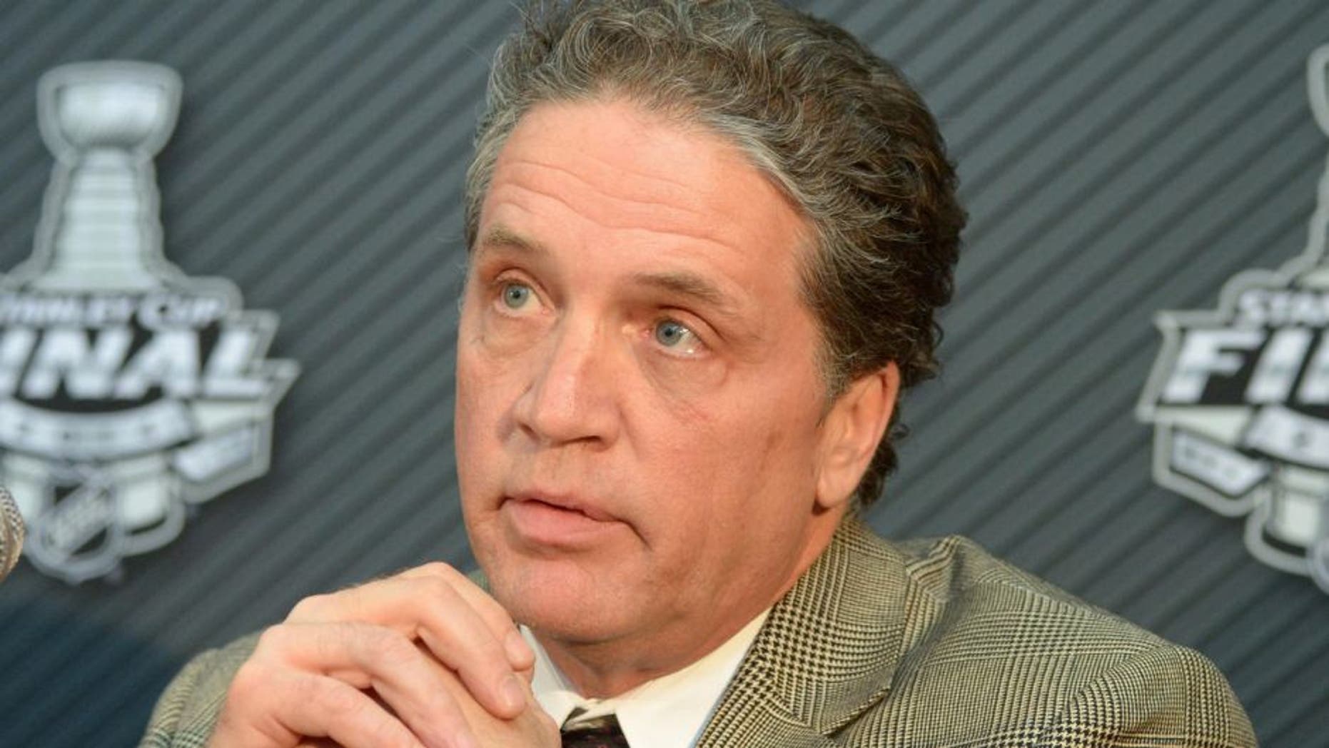 Jun 3, 2014; Los Angeles, CA, USA; Los Angeles Kings general manager Dean Lombardi during media day before game one of the 2014 Stanley Cup Final against the New York Rangers at Staples Center. Mandatory Credit: Kirby Lee-USA TODAY Sports