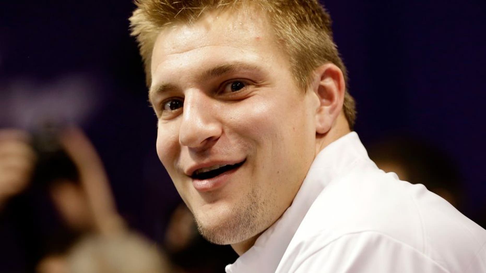 New England Patriots' Rob Gronkowski answers questions during media day for NFL Super Bowl XLIX football game Tuesday, Jan. 27, 2015, in Phoenix. (AP Photo/David J. Phillip)