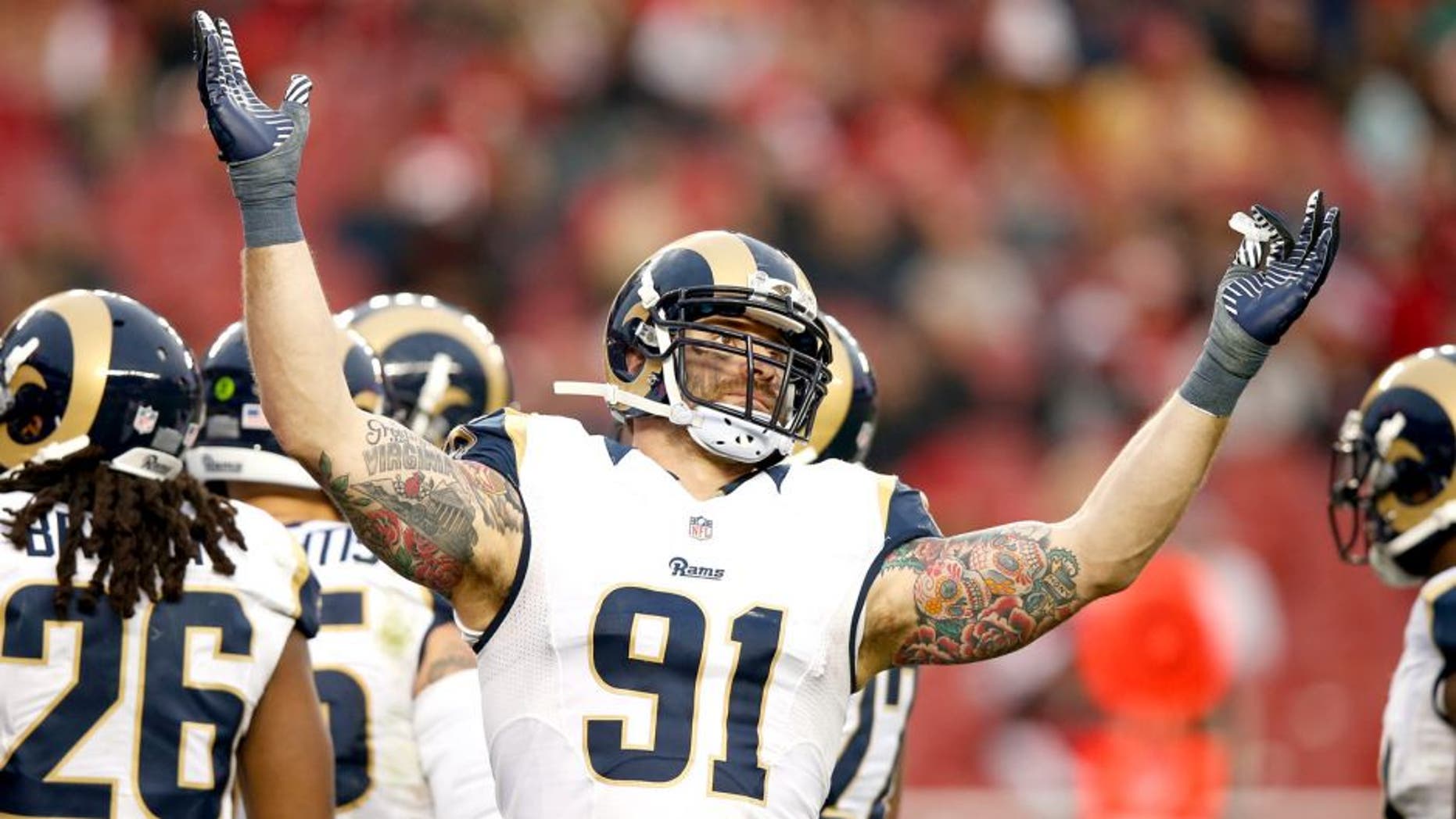 SANTA CLARA, CA - JANUARY 03: Chris Long #91 of the St. Louis Rams reacts after a play against the San Francisco 49ers during their NFL game at Levi's Stadium on January 3, 2016 in Santa Clara, California. (Photo by Ezra Shaw/Getty Images)